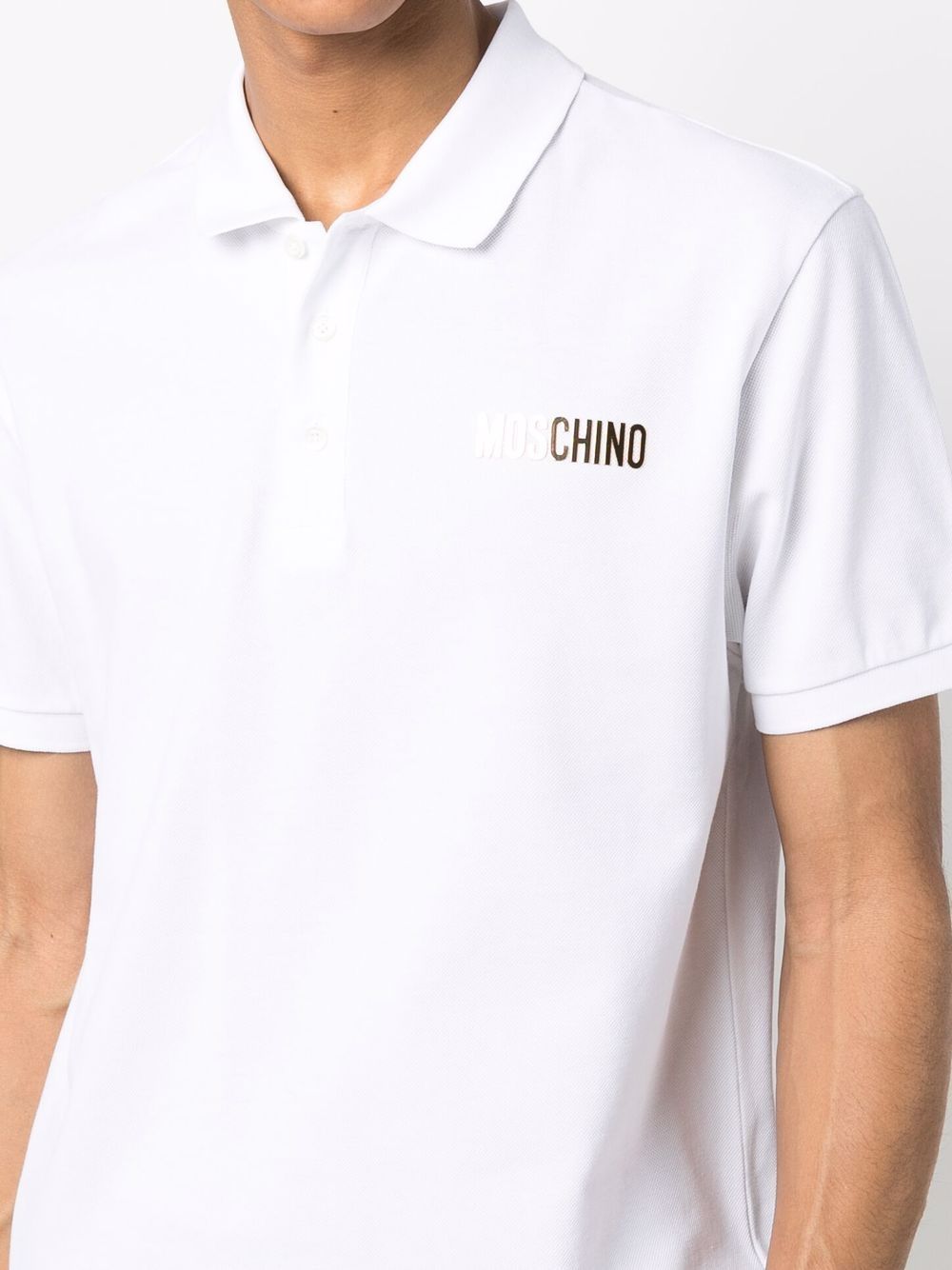 Polo bianca logo oro petto J12070242 0001 MOSCHINO COUT