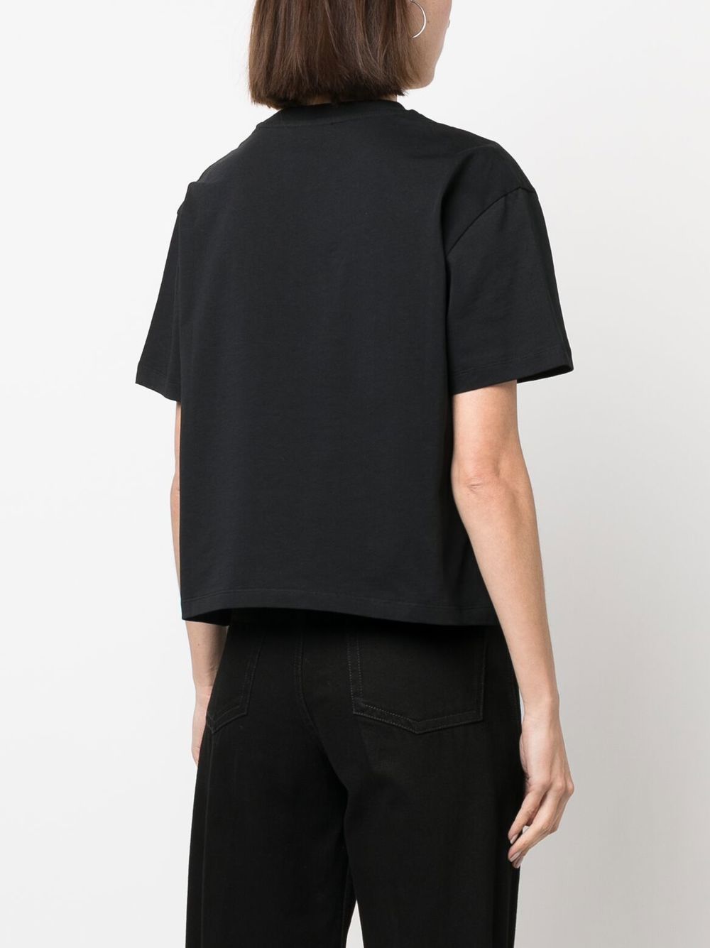 T-shirt nera con borchie tonde 23PJTE107CO0467 P001 RABANNE