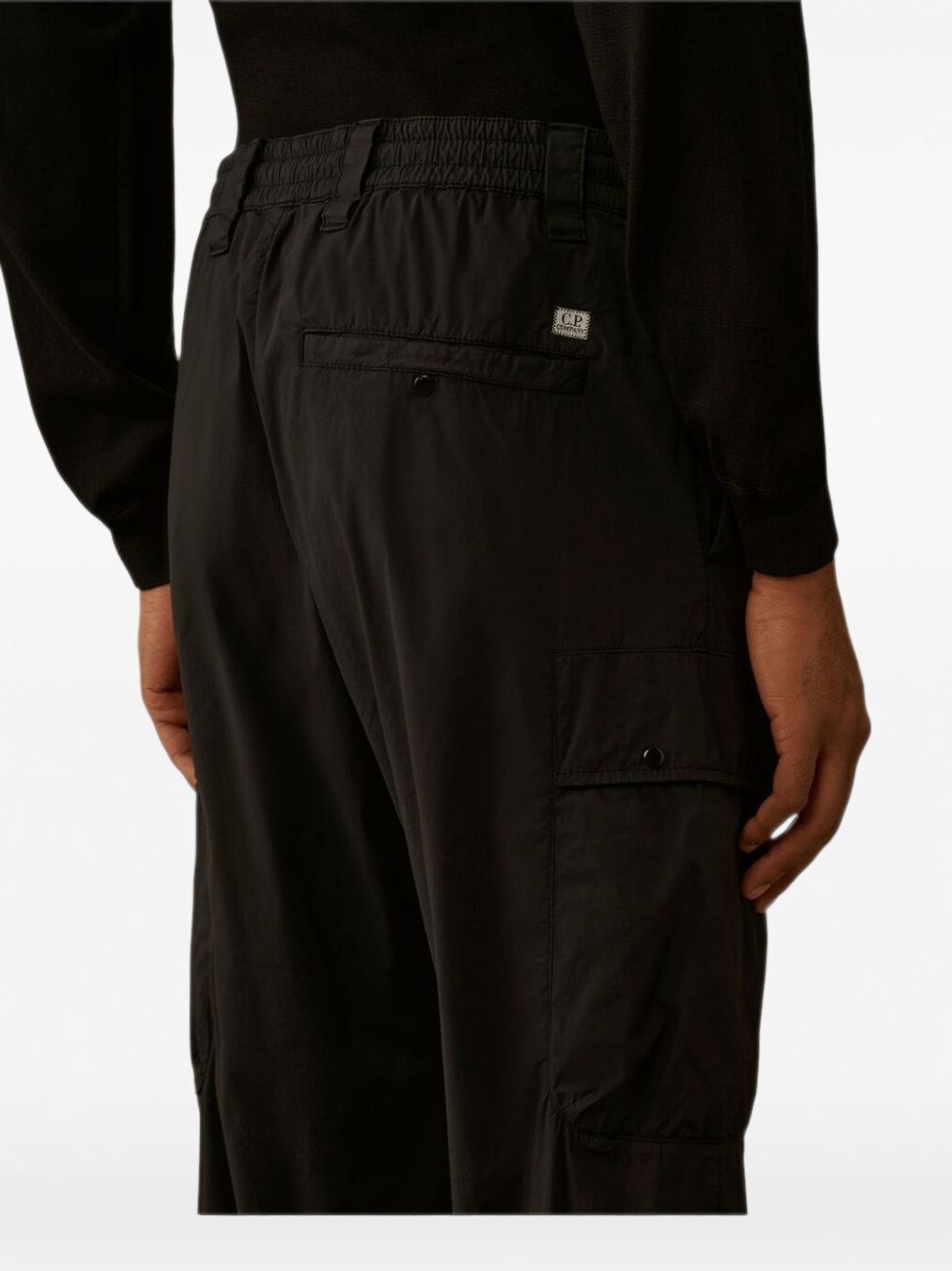 Pantaloni cargo con elastico in vita 20CMPA255A006439G 999 CP COMPANY