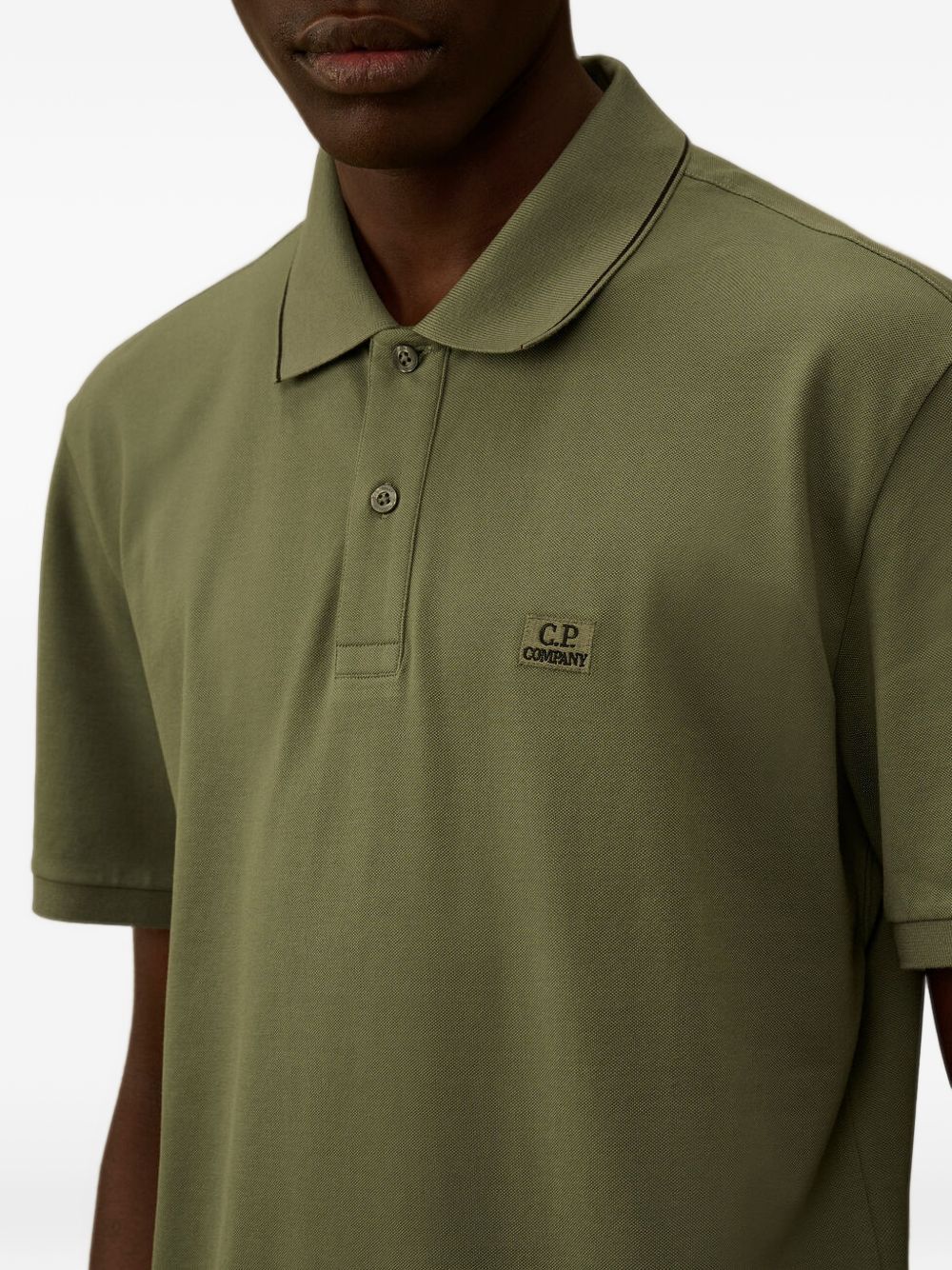 Polo a maniche corte con logo patch 20CMPL722A005263W 668 CP COMPANY