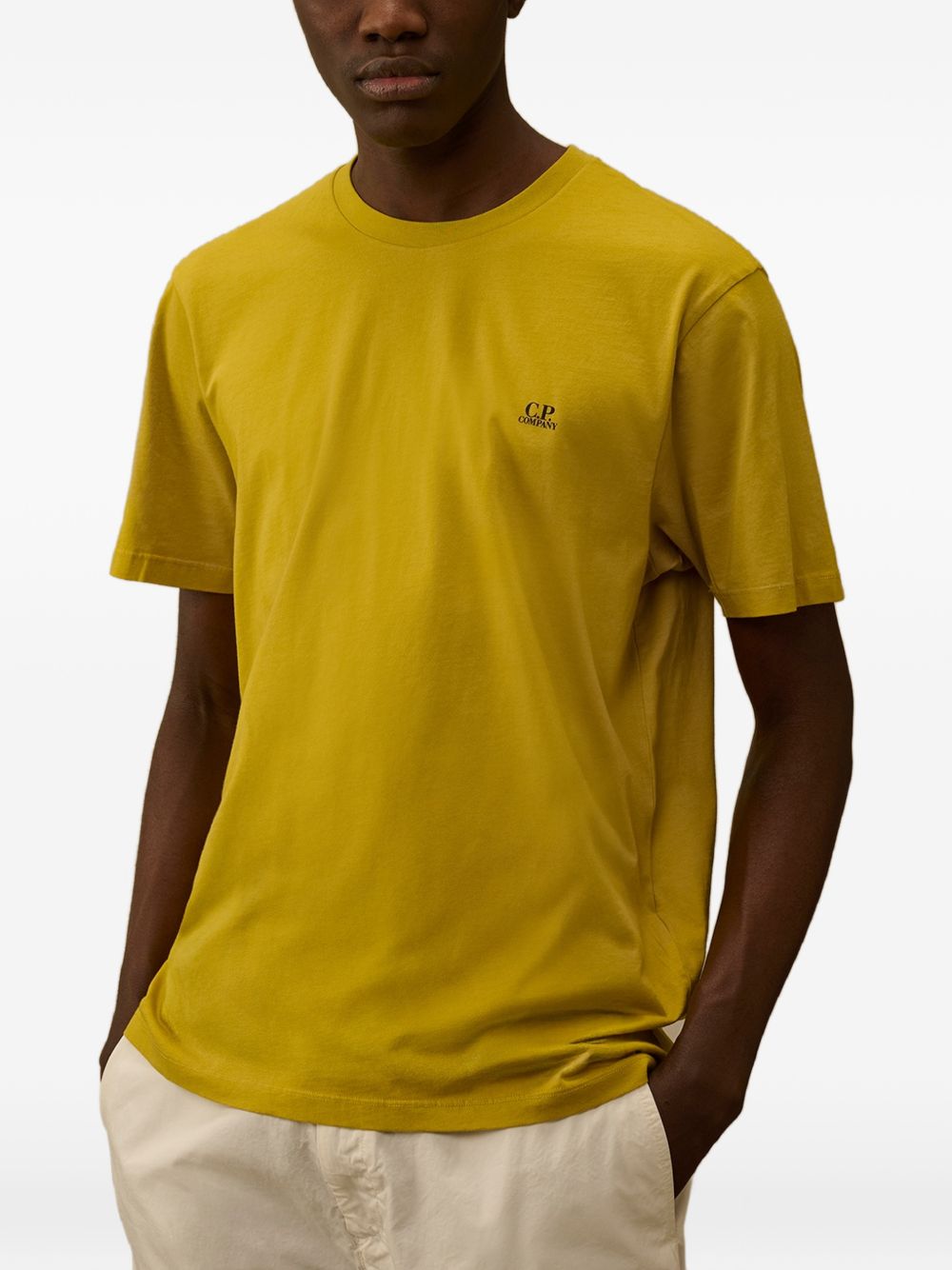 T-shirt girocollo color senape 20CMTS725A005100W 246 CP COMPANY