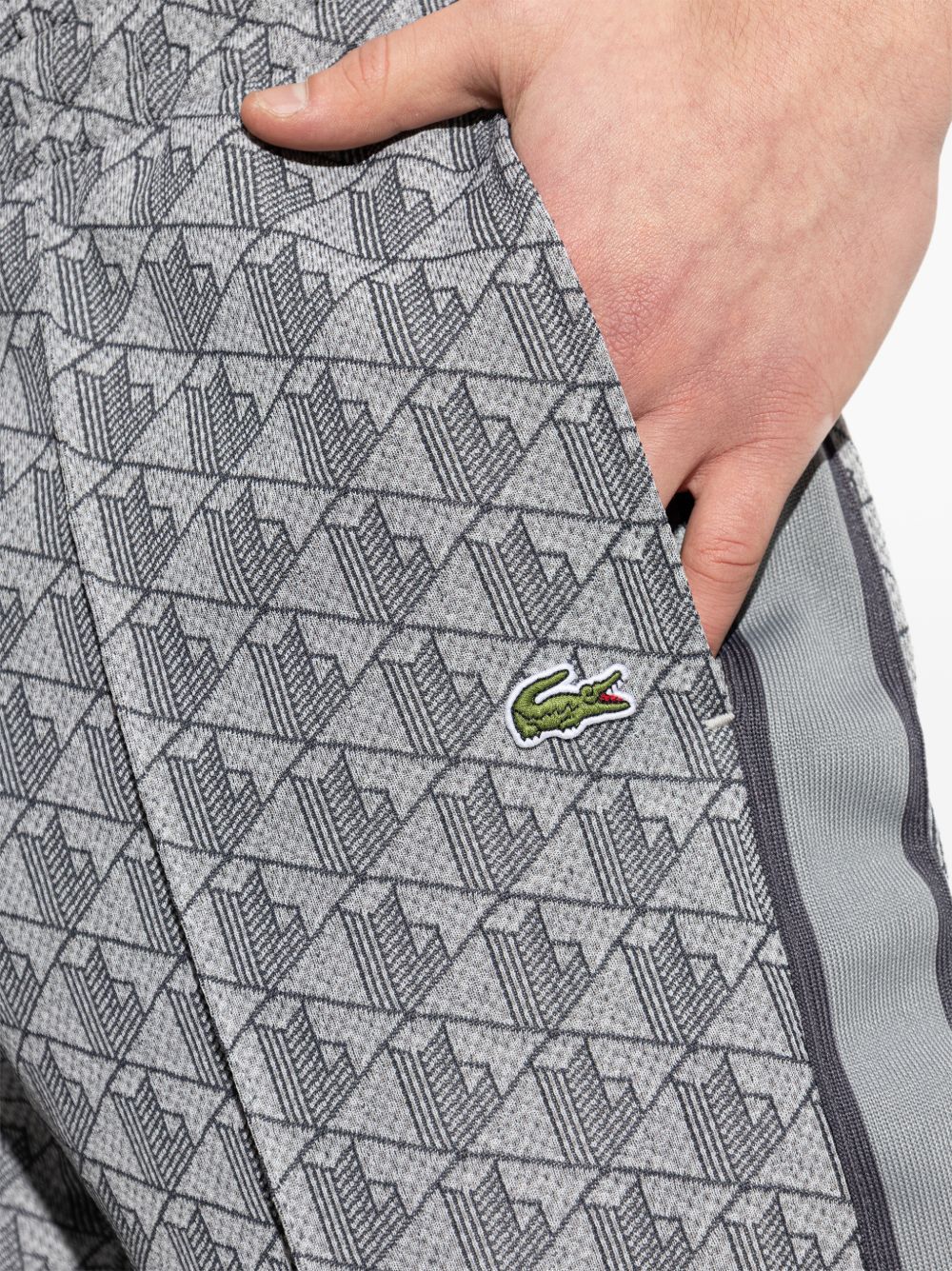 Pantaloni track con motivo all-over e banda laterale XH1440 41I LACOSTE