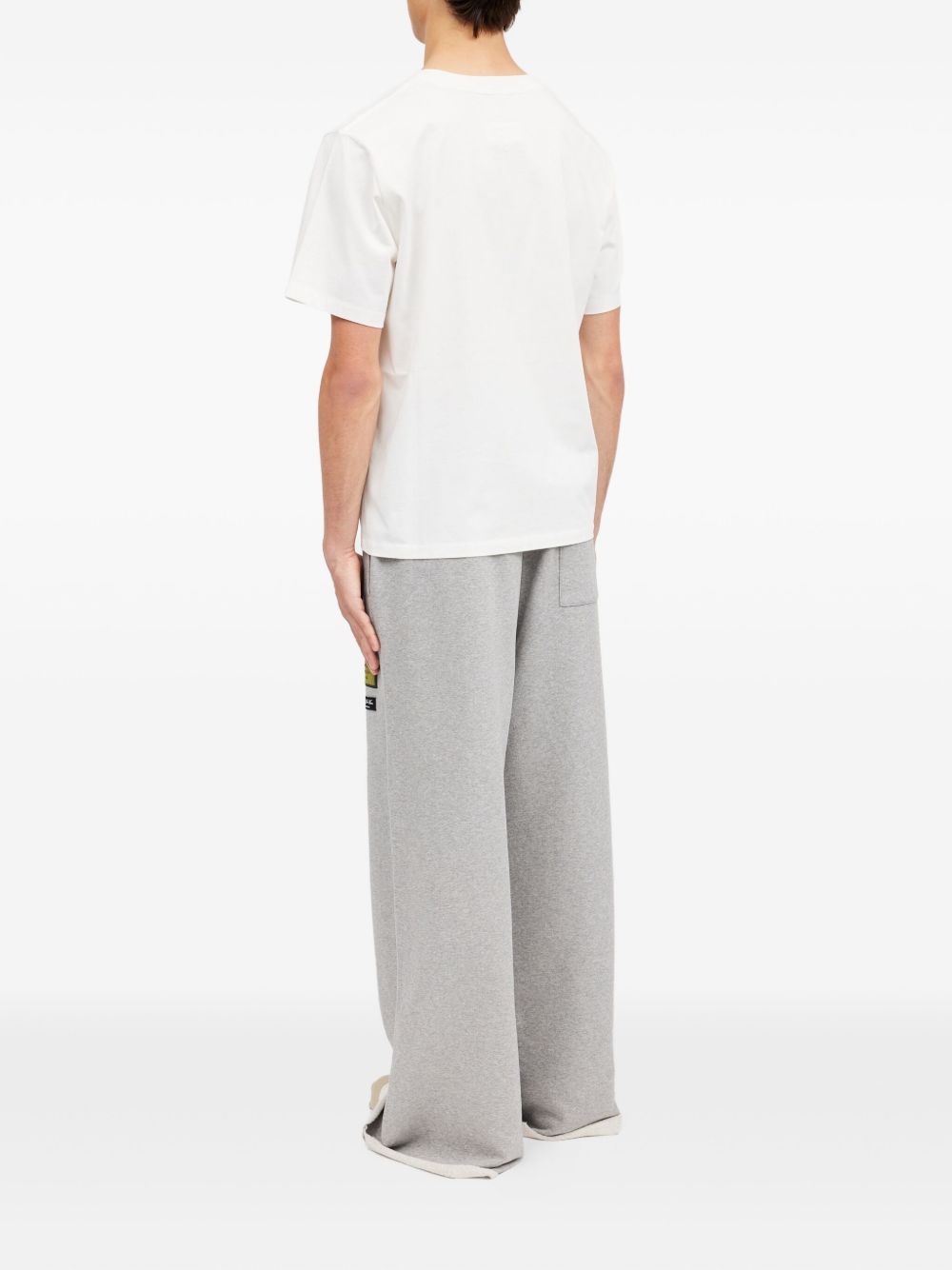 T-shirt in cotone con patch applicate SH0GC0069S24311 101 MM6 MAISON MARGIELA