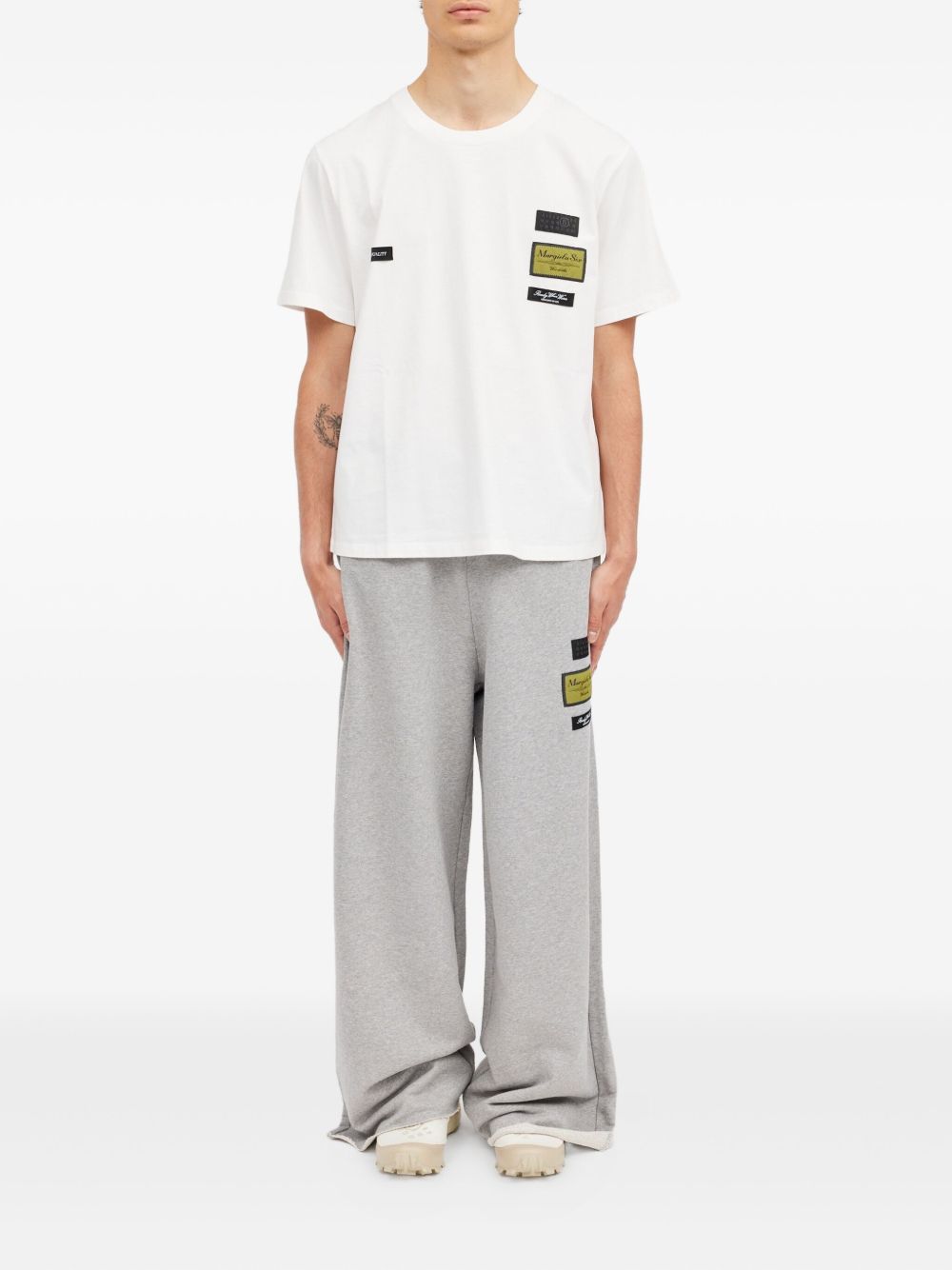 T-shirt in cotone con patch applicate SH0GC0069S24311 101 MM6 MAISON MARGIELA