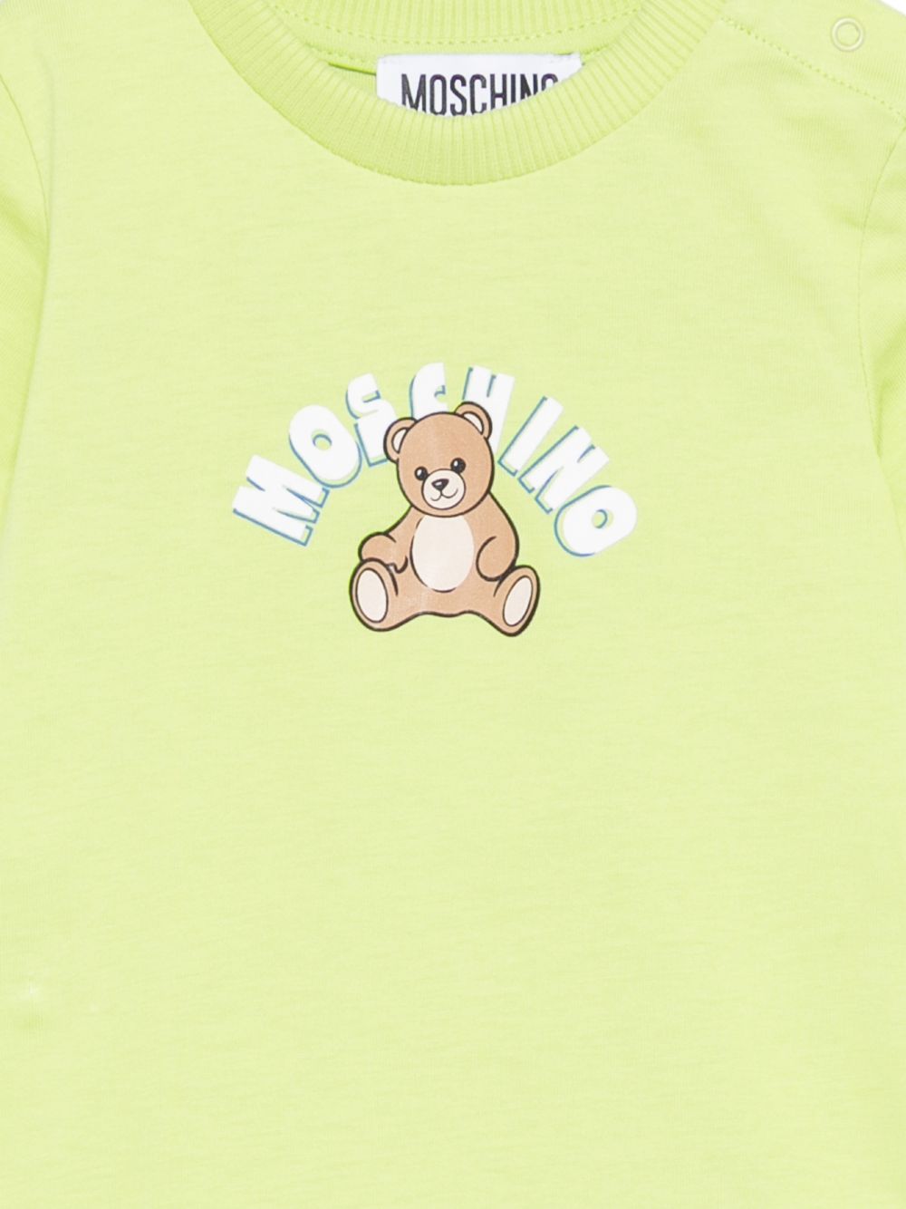 Tutina a maniche corte con stampa MTY022LAA01 30355 MOSCHINO KIDS