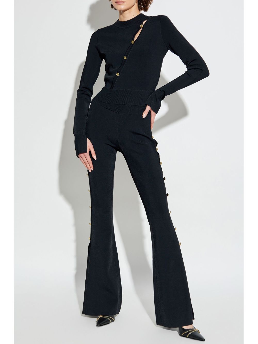 Pantalone nero cut-out laterali 77HAAMB4CM61H 899 VERSACE JEANS