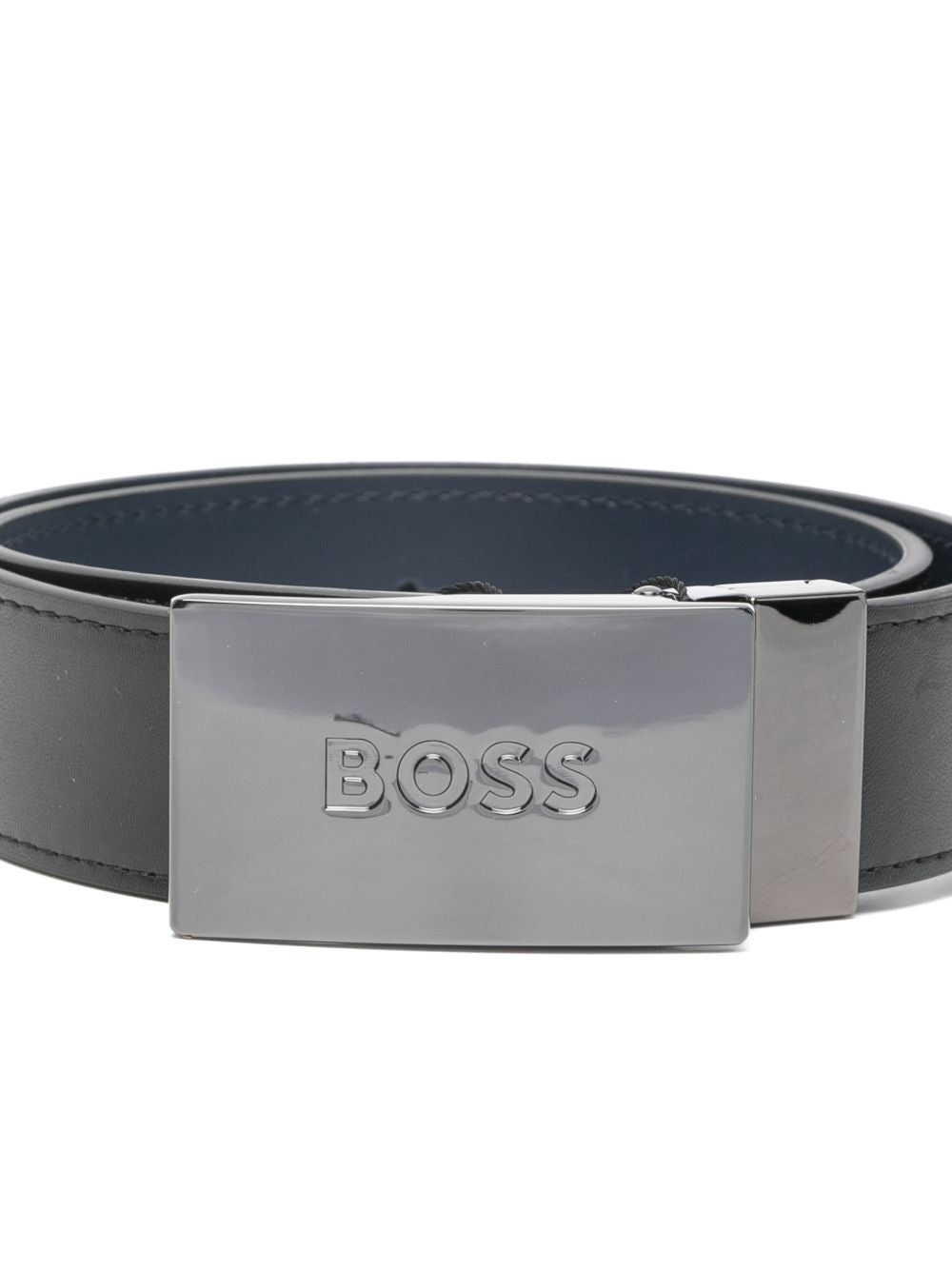 Reversible cintura in cow leather con engraved brand metal buckle. Painted edges for better finishing. Mineral tanning. Sold in a branded woven bag J53151 09B BOSS KIDSWEAR