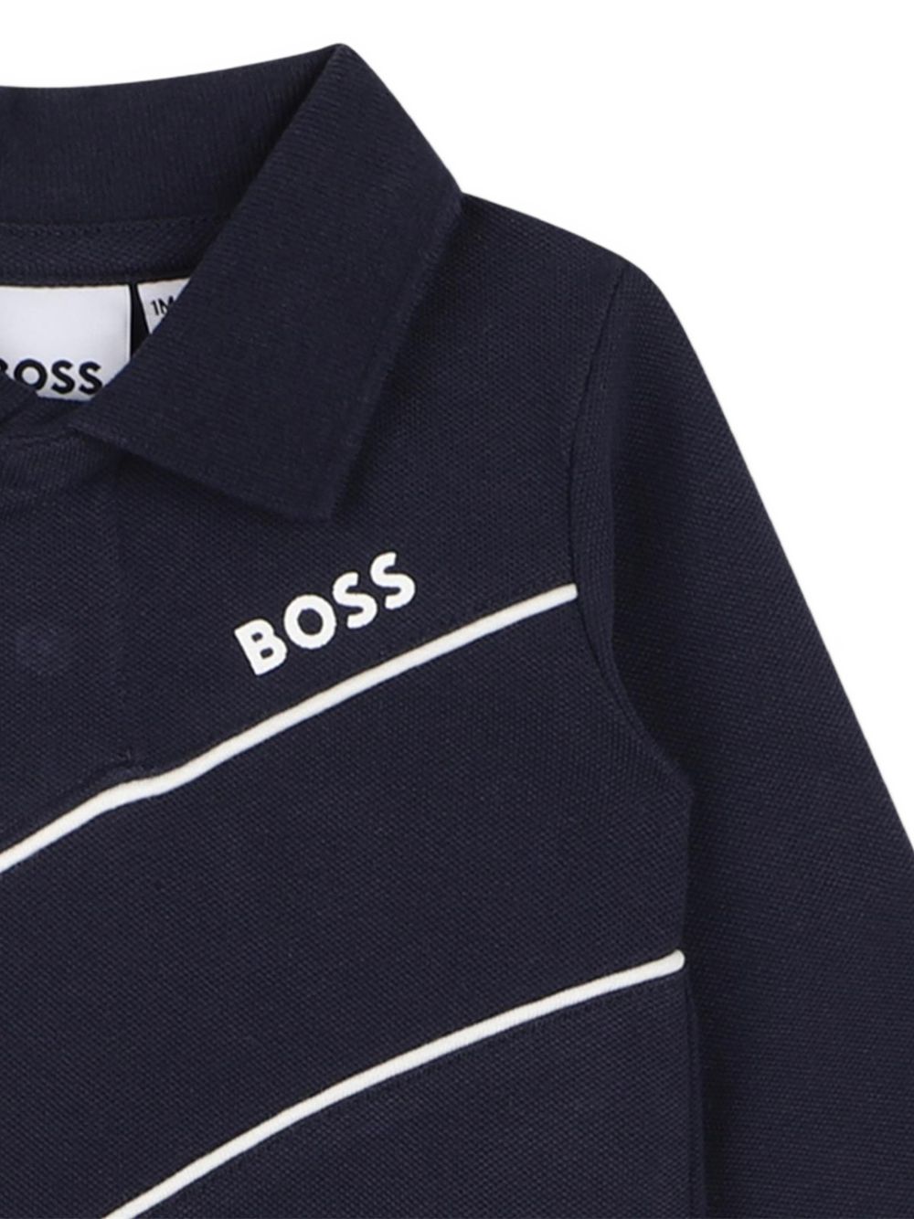Organic cotton e polyester velour pajamas. Polo collar, davanti chiusura con bottoni automatici, "boss" stampa, e piped chest seam. Sold in a gift box. J53288 849 BOSS KIDSWEAR