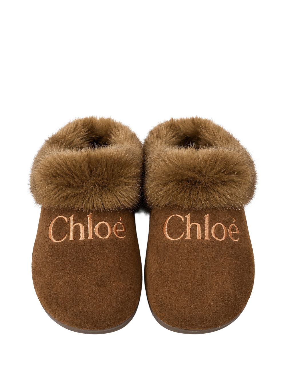 Mule in goat split leather (mineral tanning) e eco-pelliccia, faux shearling fodera, insock in cork e faux shearling, rubber outsole, ricamato chloe logo on davanti. Sold in a branded shoe box. Made in portugal. C21333 31F CHLOE KIDS