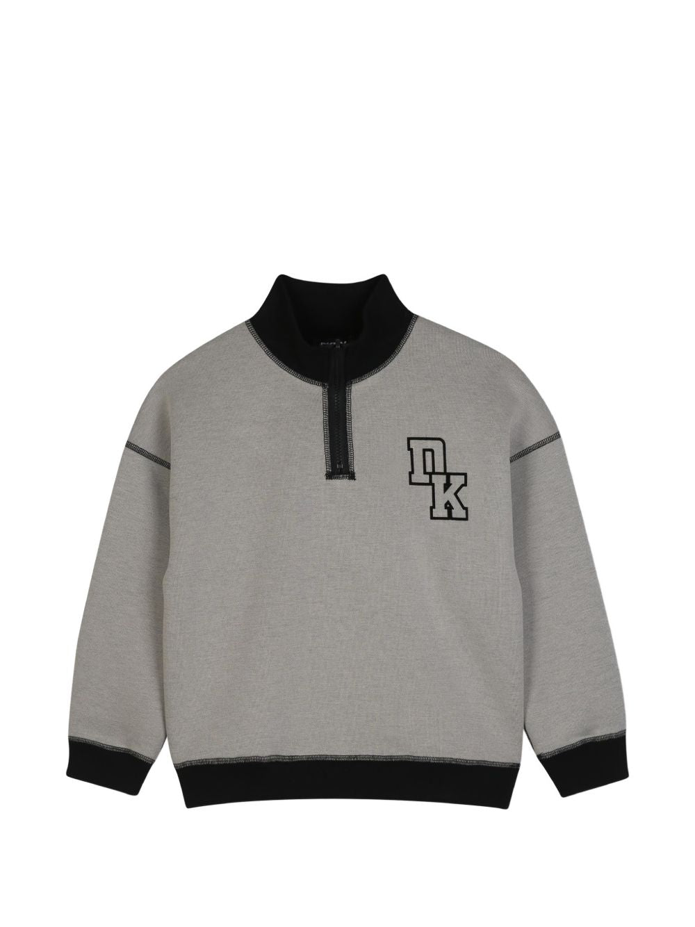 Reversible sweatshirt in doble jersey, 86% polyester 10% viscose 4% elastane, con high collar. One black side in jersey piqué effect con printed dkny logo at chest. Other side in beige jersey con dk logo in flocking technic at chest. D62868 P90 DKNY KIDS