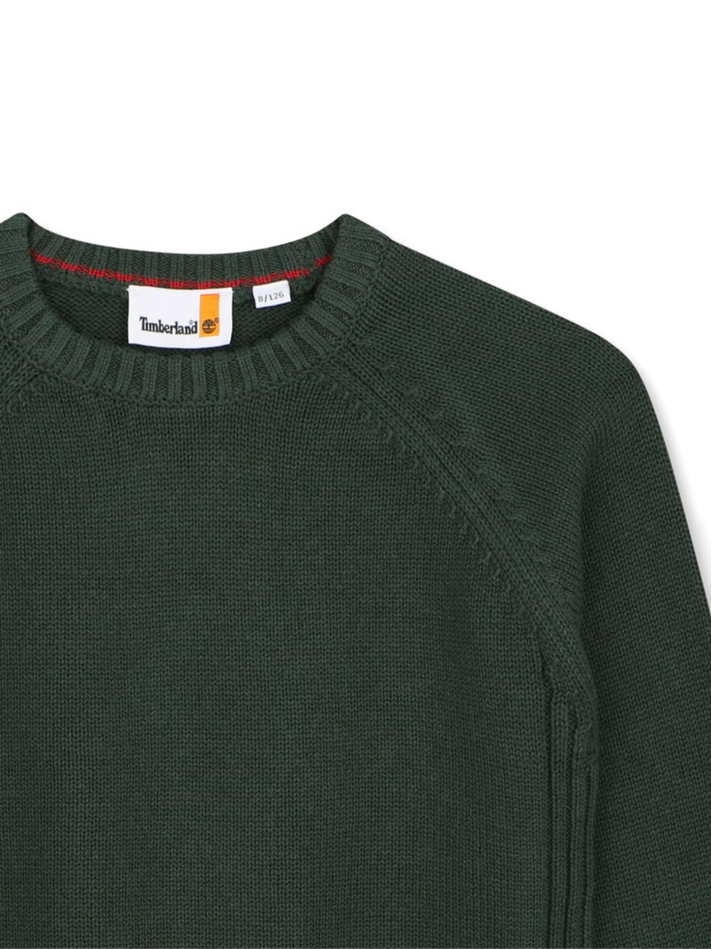 85% cotton / 15% wool in maglia felpa, different knit stitch pattern on sides, printed logo on paper label at fondo. T61081 68R TIMBERLAND KIDS