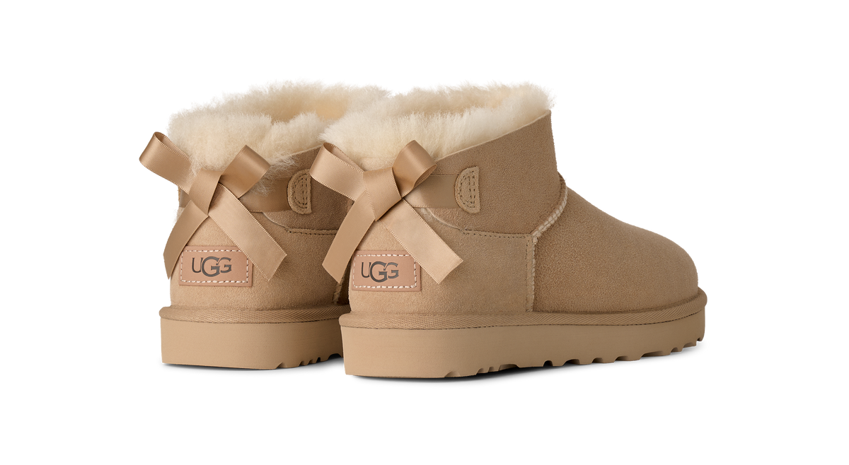 Stivaletti con fiocco beige 1185491 SAN UGG