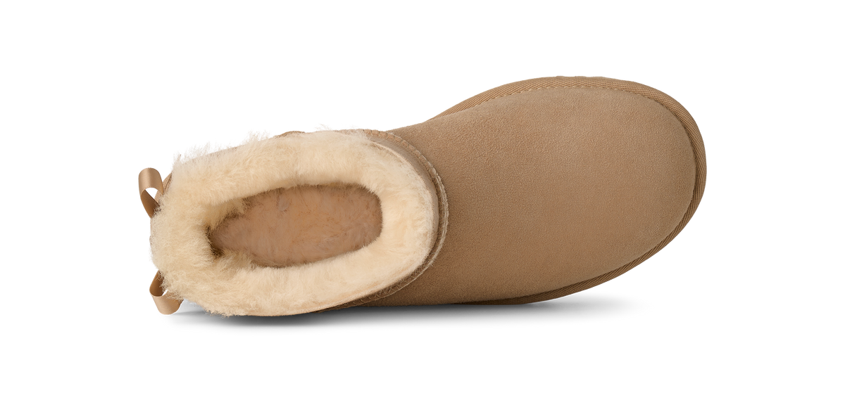 Stivaletti con fiocco beige 1185491 SAN UGG