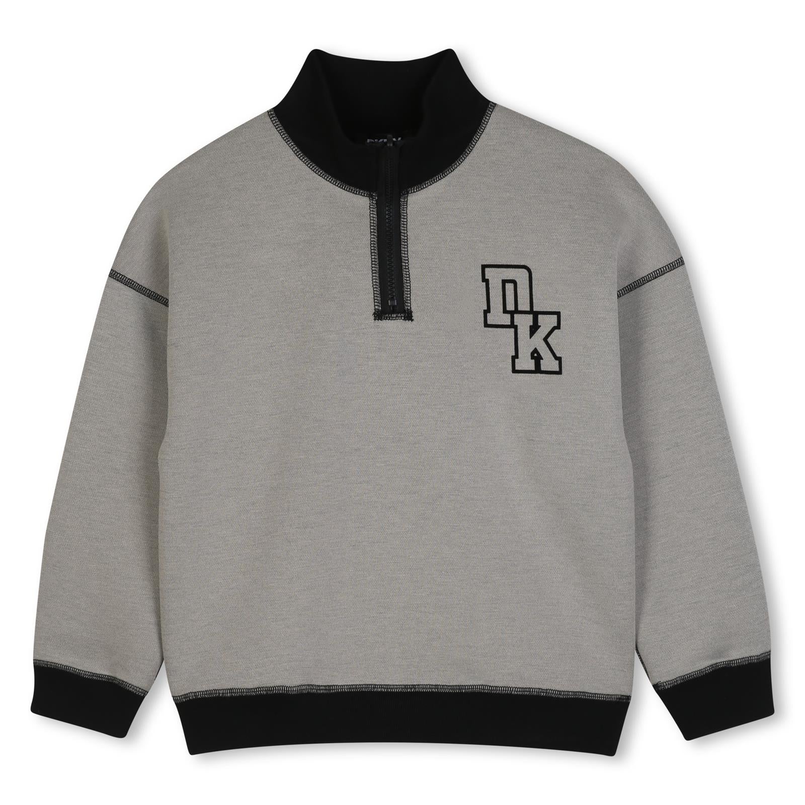 Reversible sweatshirt in doble jersey, 86% polyester 10% viscose 4% elastane, con high collar. One black side in jersey piqué effect con printed dkny logo at chest. Other side in beige jersey con dk logo in flocking technic at chest. D62868 P90 DKNY KIDS