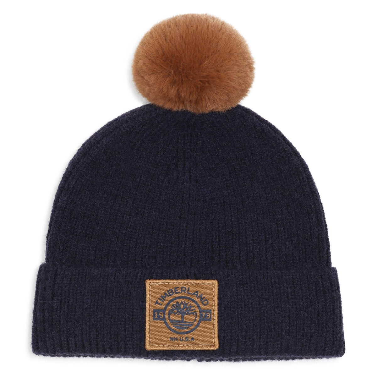 In maglia beanie con turn up e eco-pelliccia pompom. Badge con branded stampa. Mixed composition: pc/pl/pa. T61095 849 TIMBERLAND KIDS