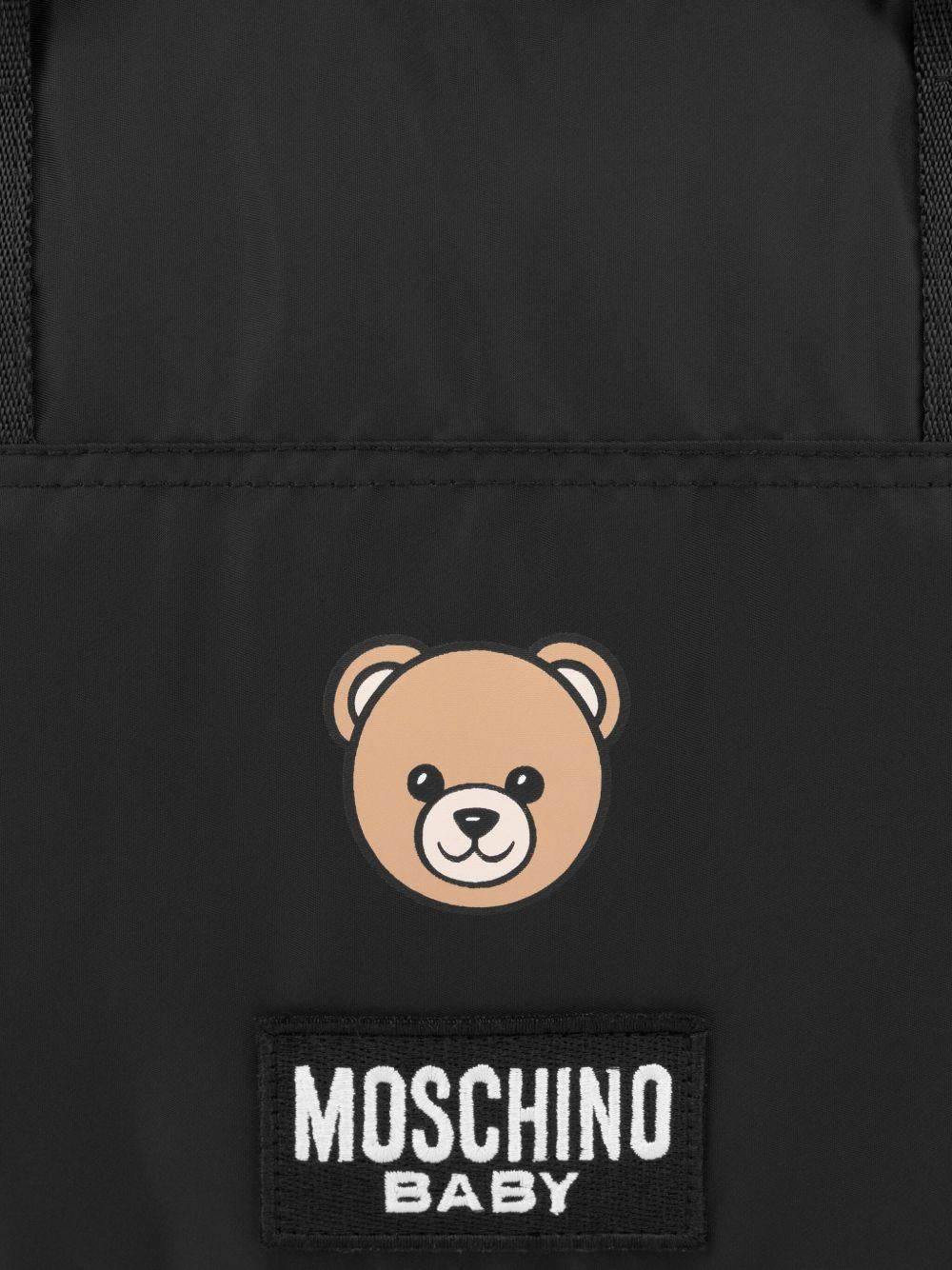 Borsa fasciatoio nera con stampa MMX04KL3A89 60100 MOSCHINO KIDS