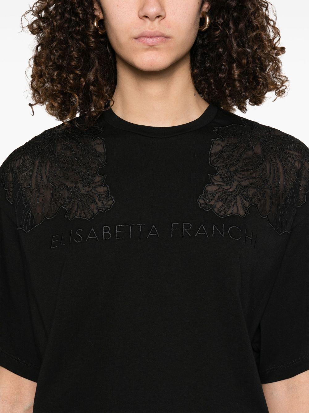 T-shirt nera con ricami semitrasparenti e logo