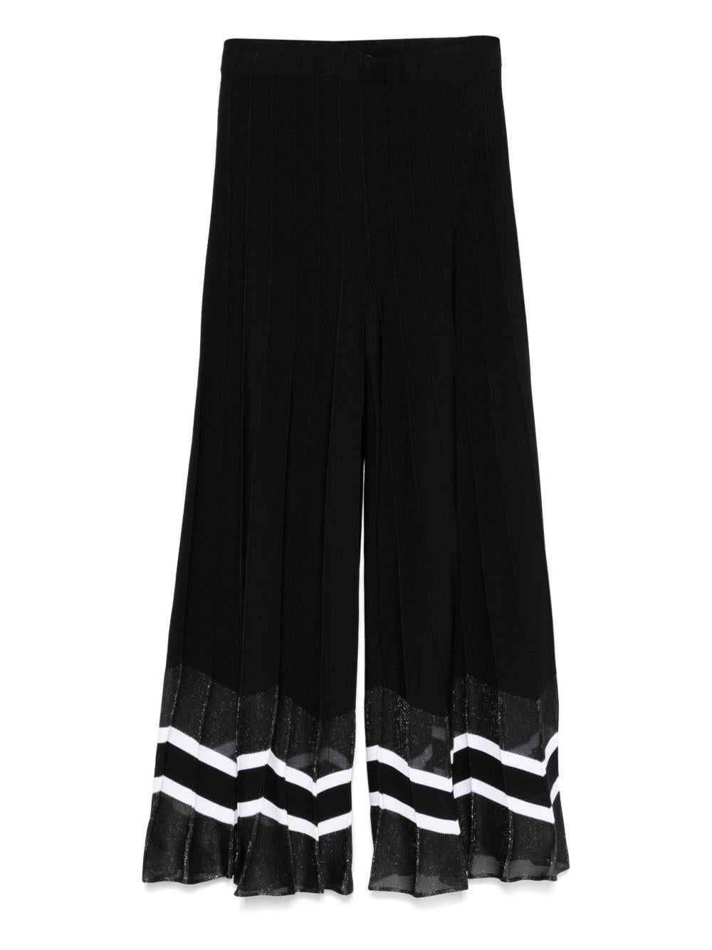 Pantalone nero a gamba ampia orlo chevron