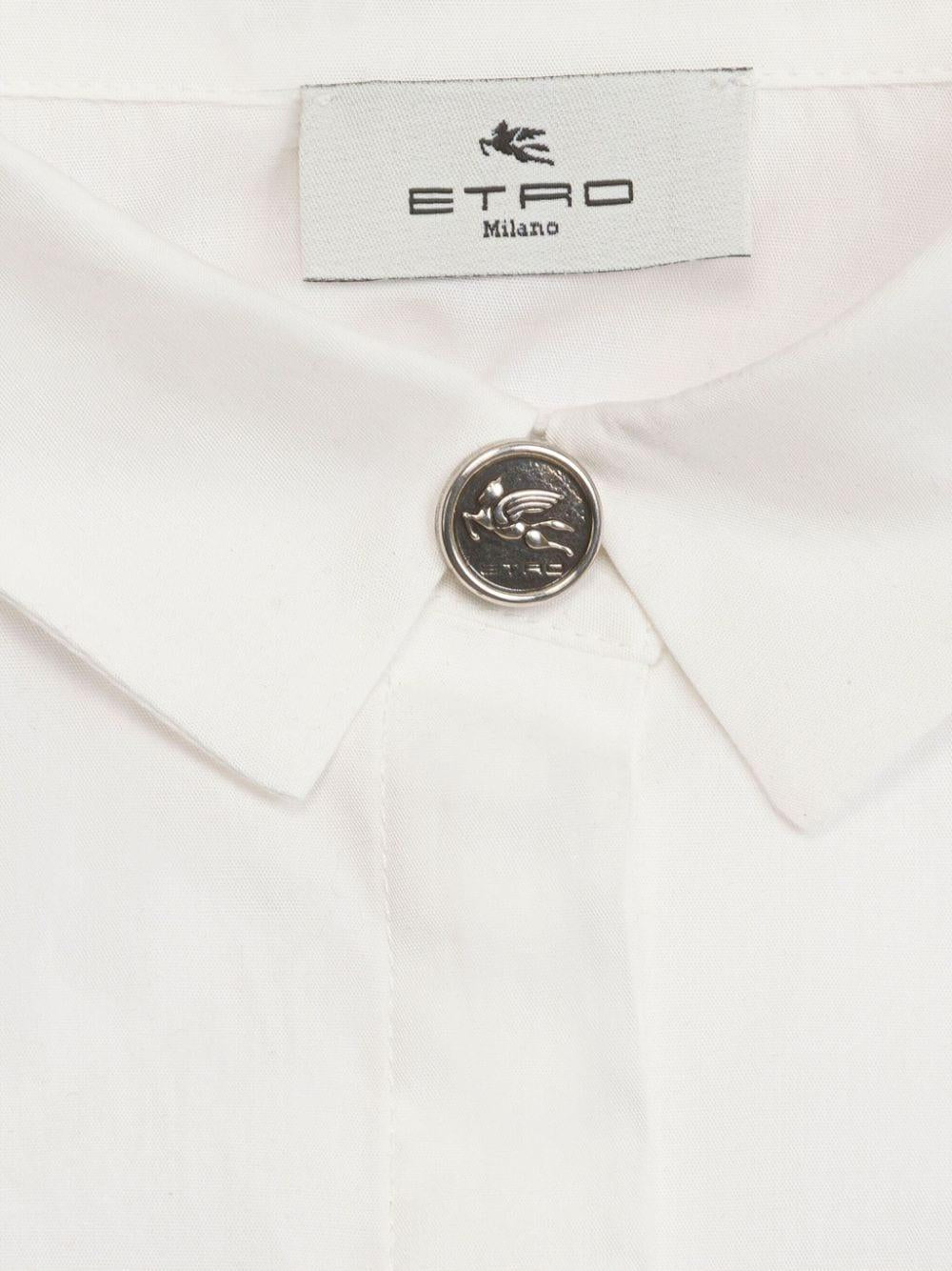 Camicia bianca dettaglio bottone Pegaso