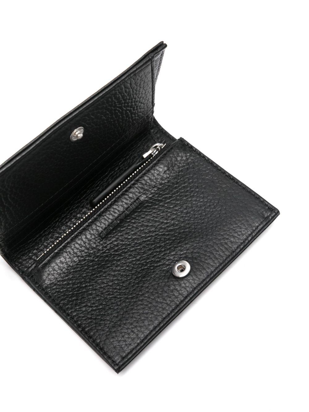 Portafoglio nero con logo-lettering e doppia piega EM000956AF13396 UC001 EMPORIO ARMANI
