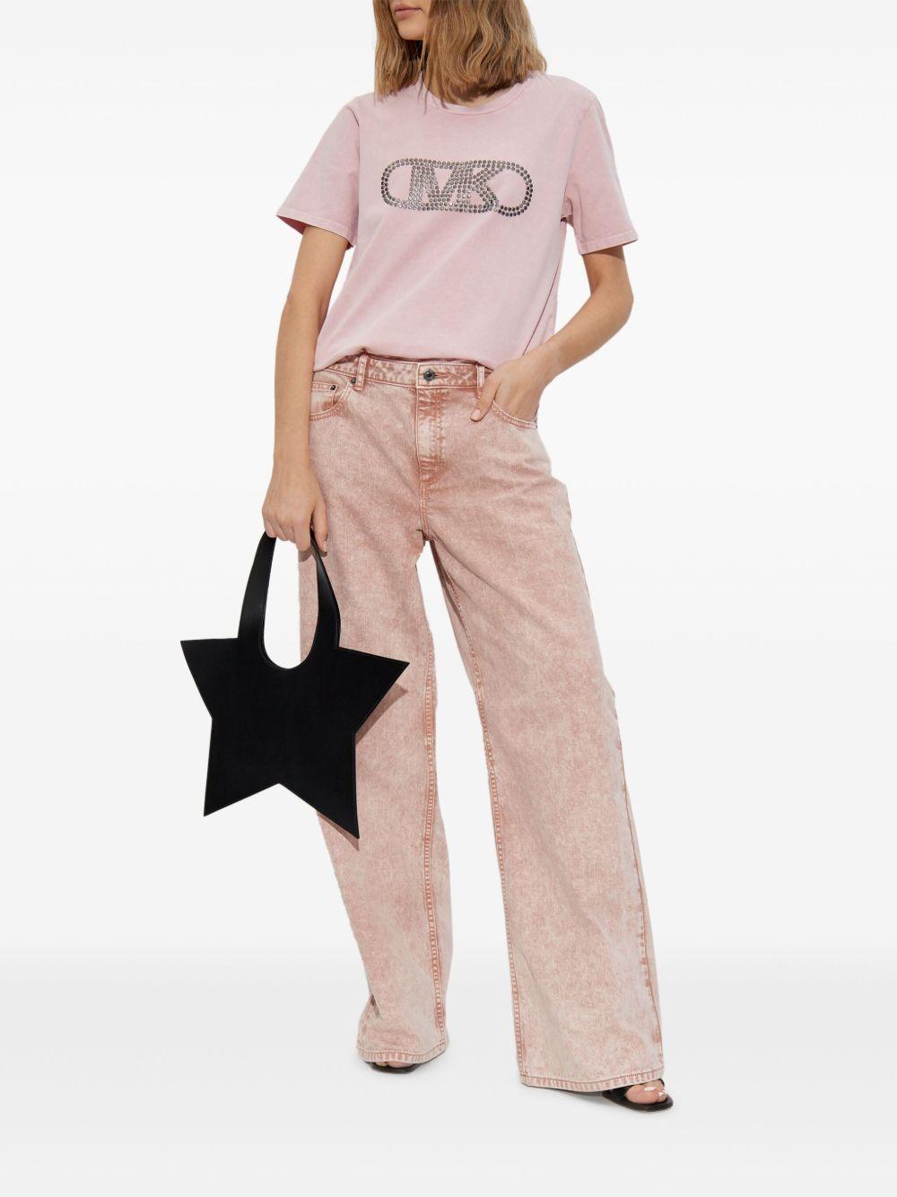 Jeans rosa tie-dye a gamba ampia