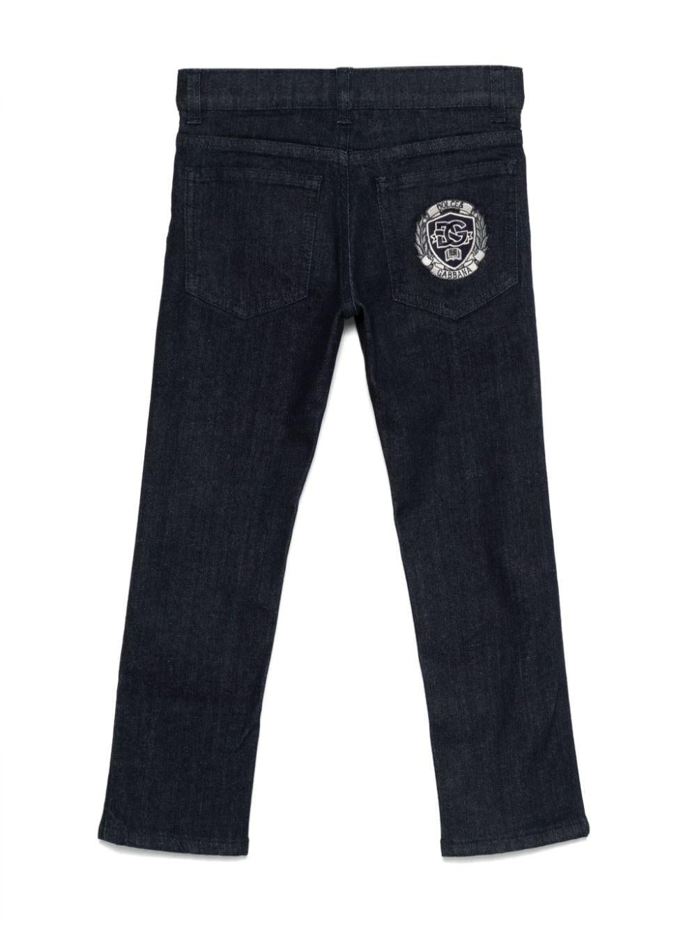 Jeans blu scuro cinque tasche logo ricamo retro