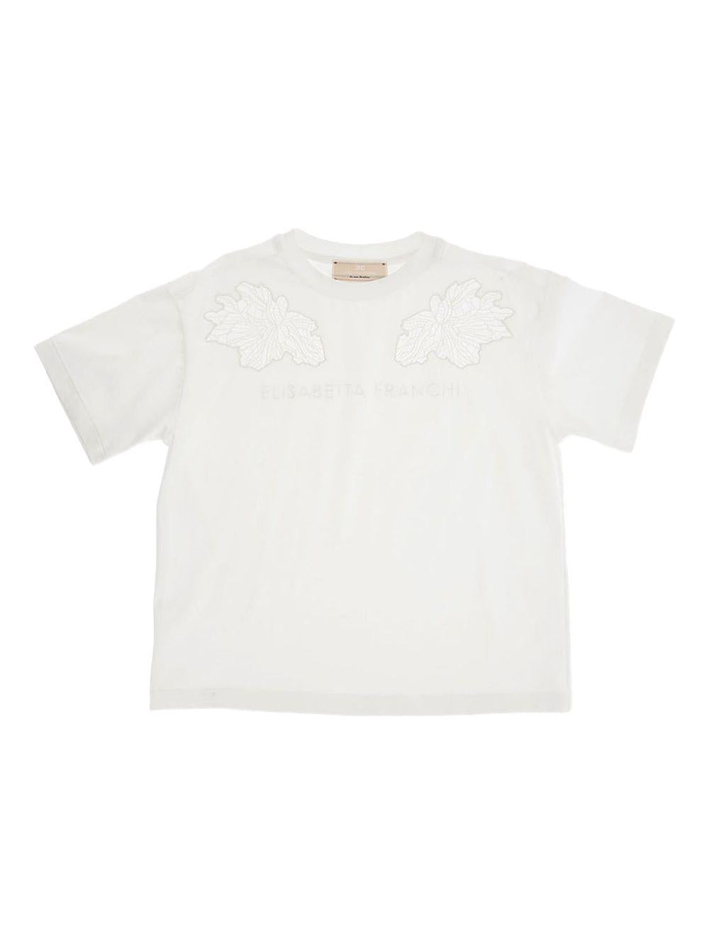 T-shirt panna con ricami floreali velati spalle