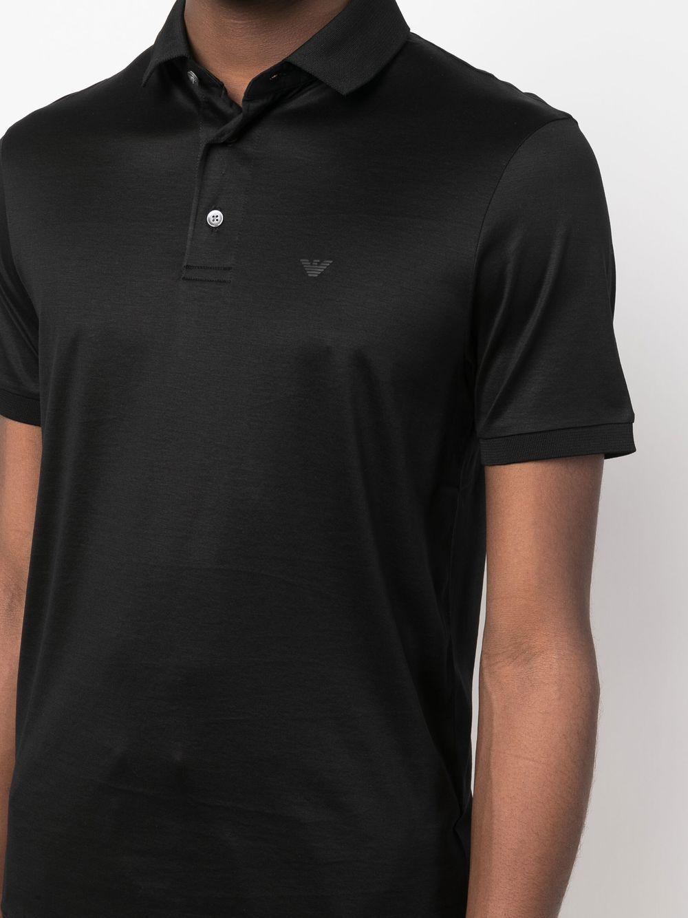 Black polo shirt with mini chest logo