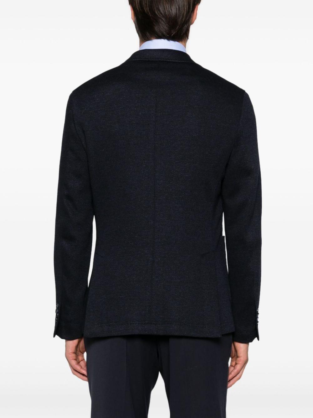 Blazer blu micro texture con spilla logo