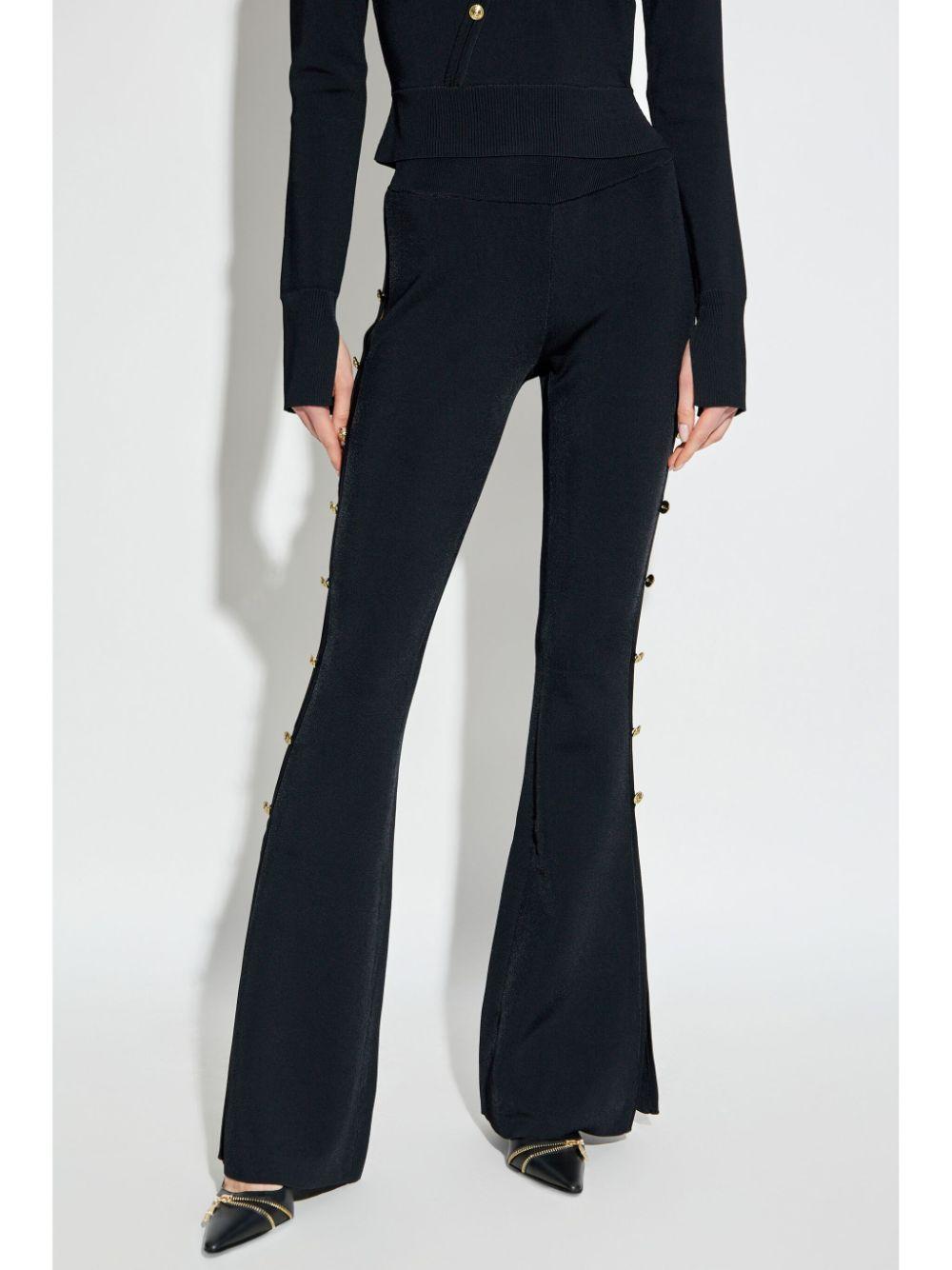 Pantalone nero cut-out laterali 77HAAMB4CM61H 899 VERSACE JEANS
