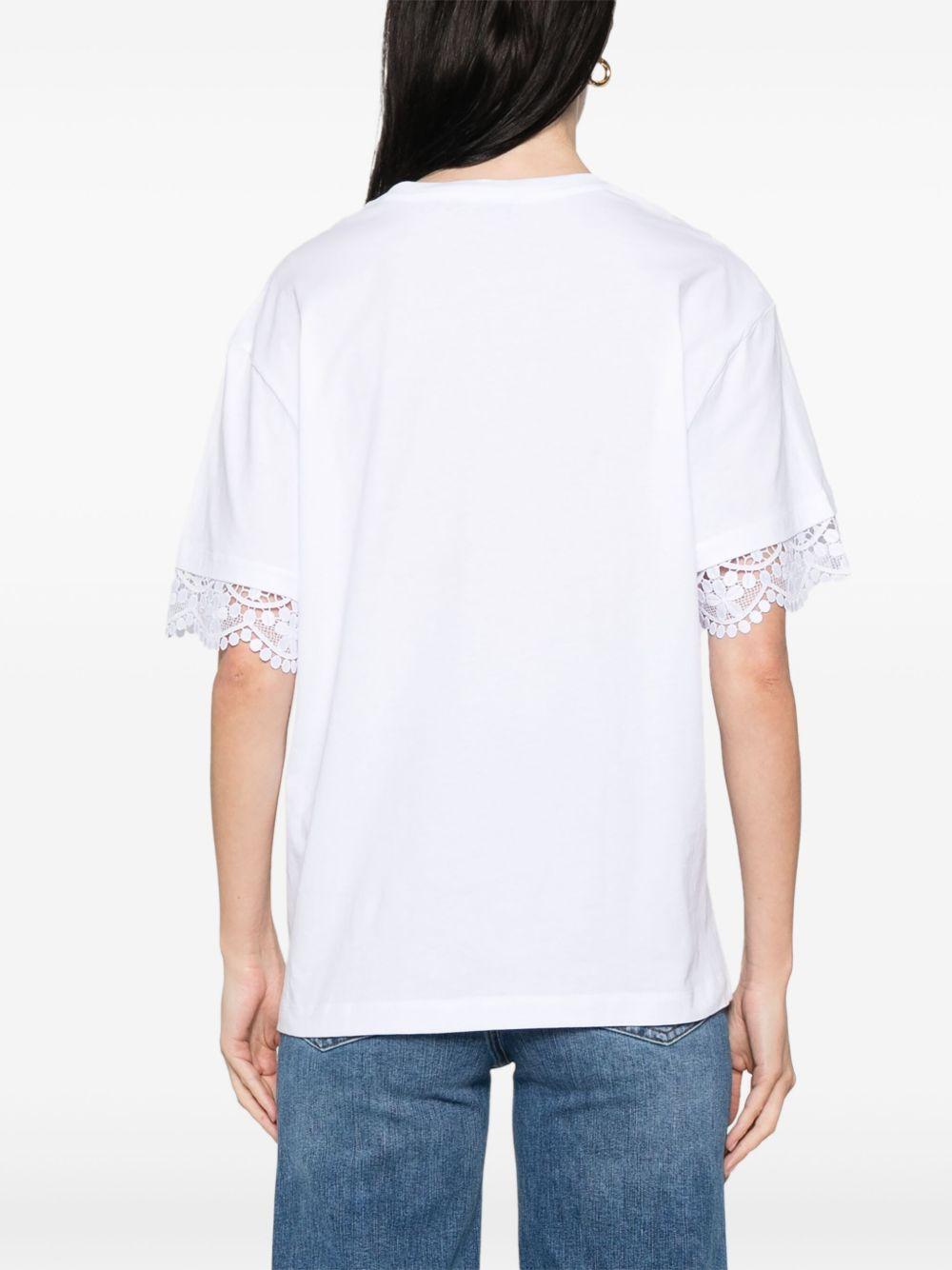 T-shirt bianca con orli ricamati