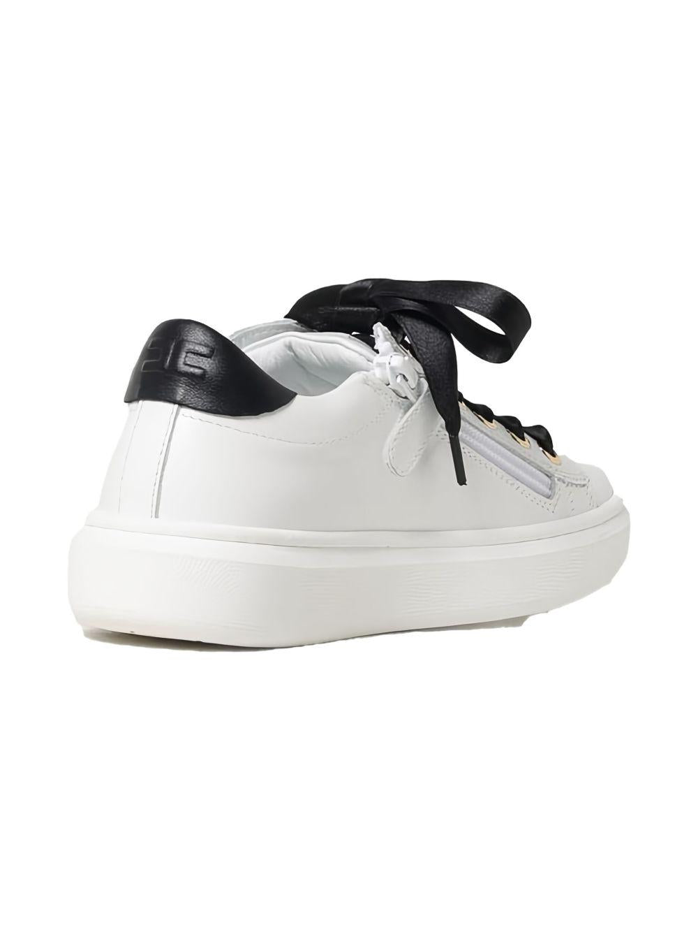 Sneakers bianche con lacci in raso neri