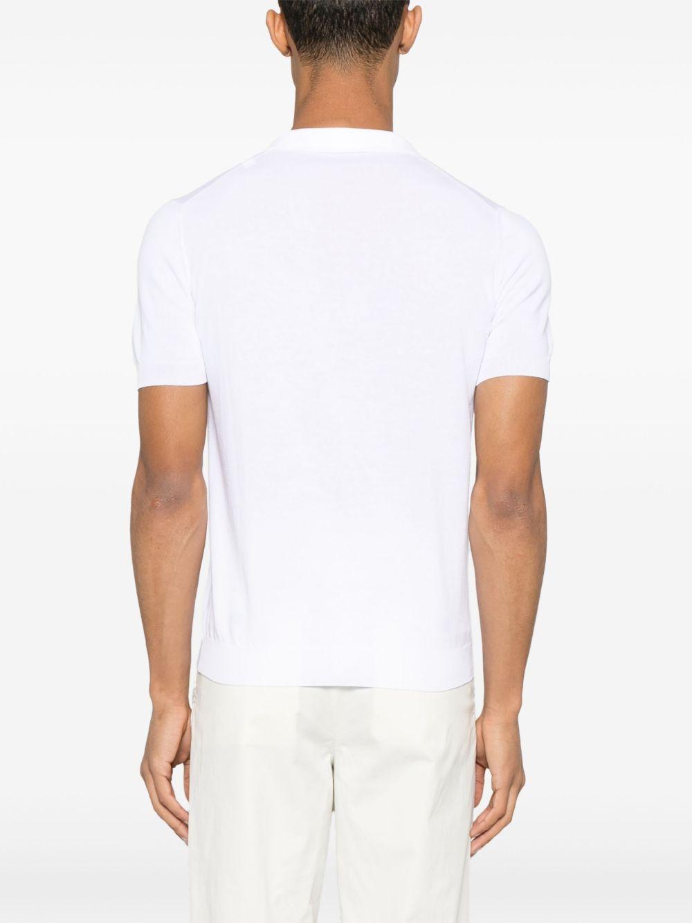 Polo Keith in maglia bianca