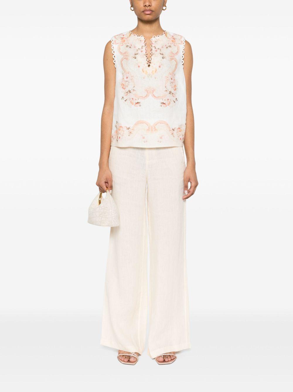 Top bianco con fantasia floreale