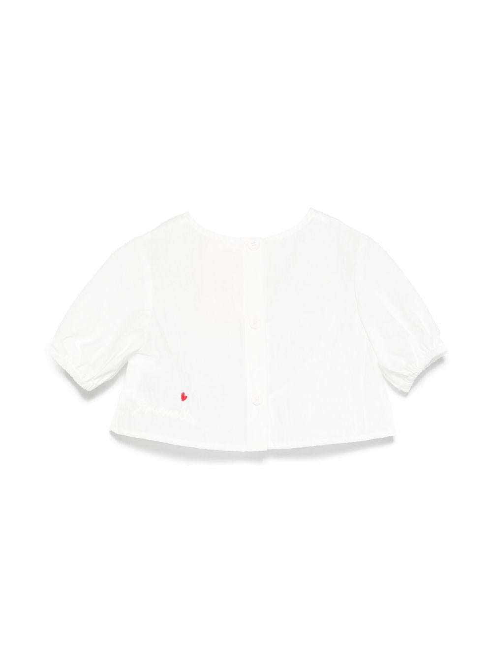 Top bianco neonata con chiusura bottoni
