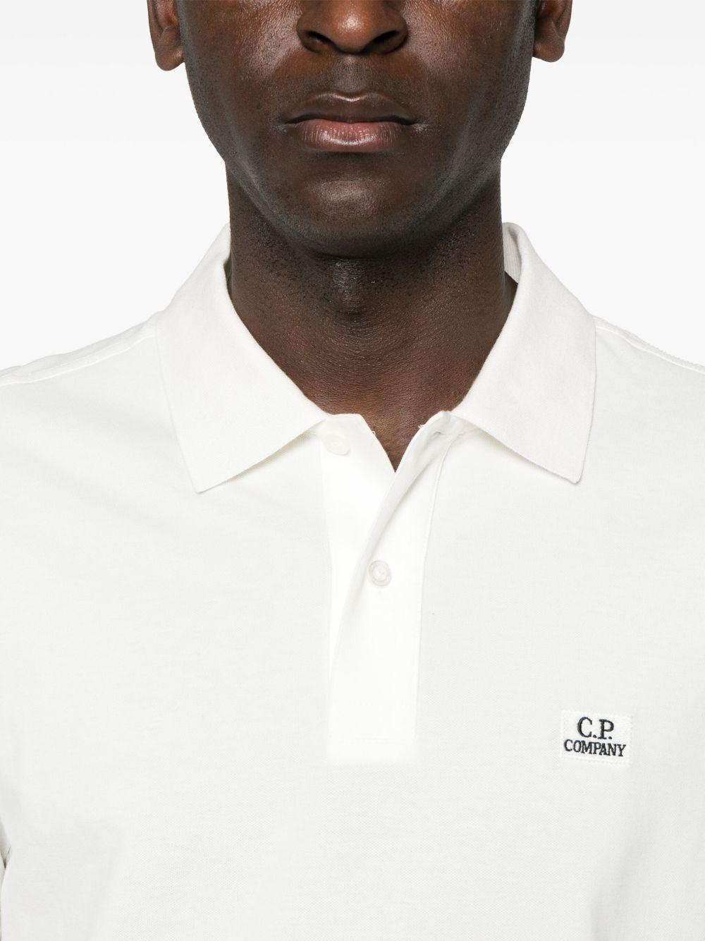Polo bianco strech piquet mini logo petto