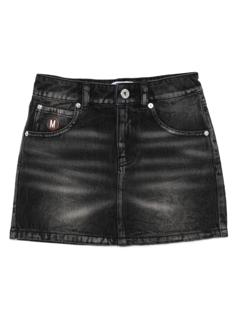 Minigonna denim nera con placca logo HDJ03ZL0E19 60129 MOSCHINO KIDS