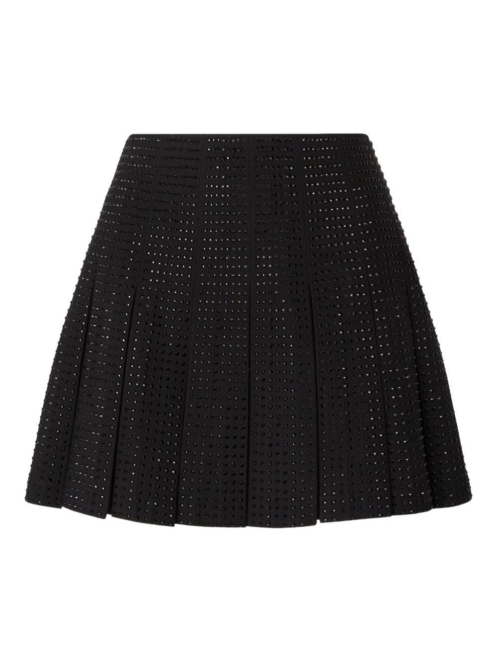 Minigonna nera con dettaglio plissettato e decorazione con cristalli 105926A287 Z99 PINKO