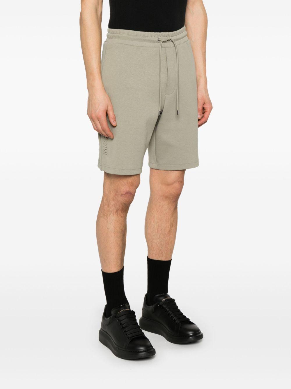 Bermuda beige logo laterale