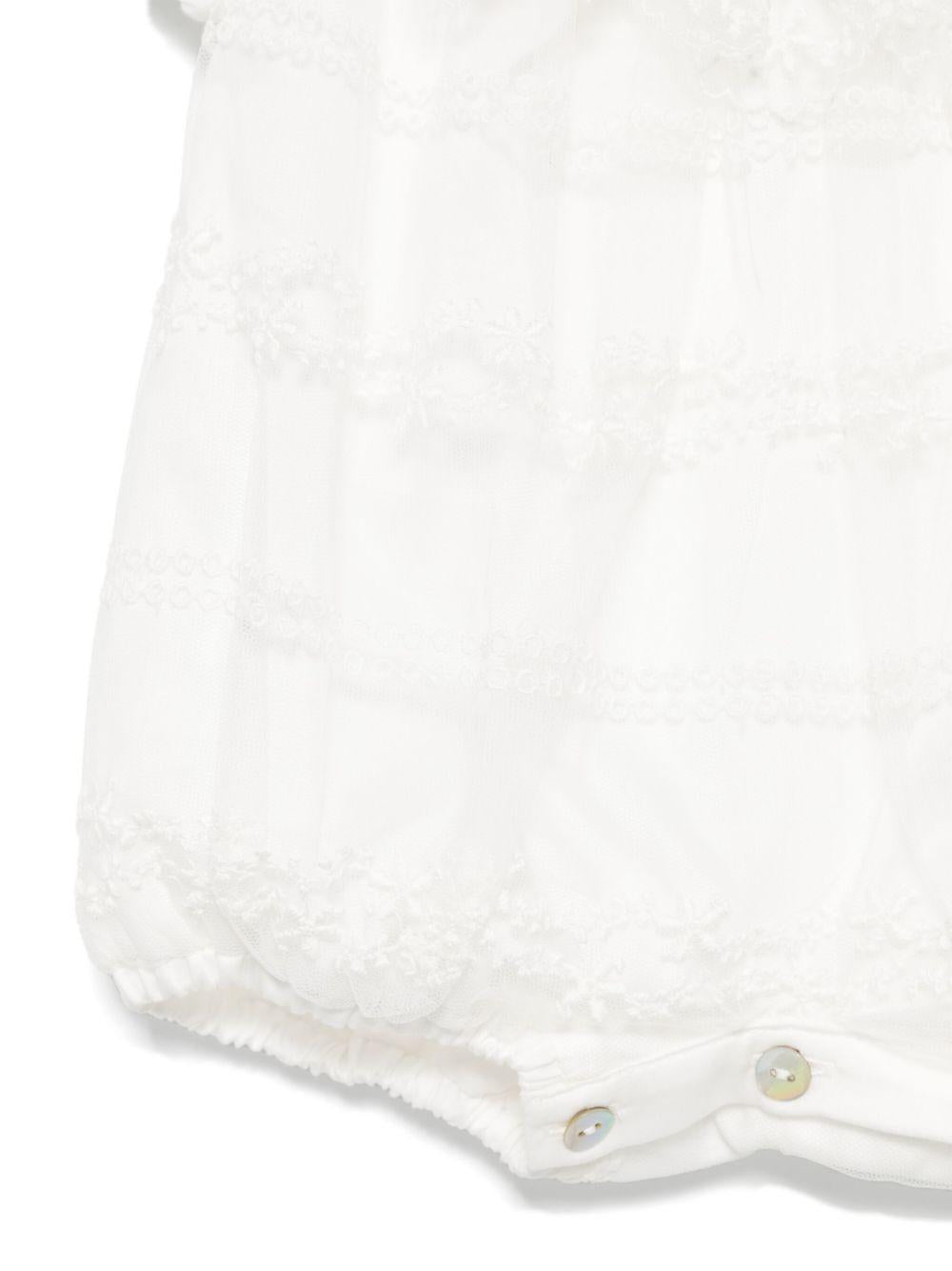 Tutina bianca con ricami all-over