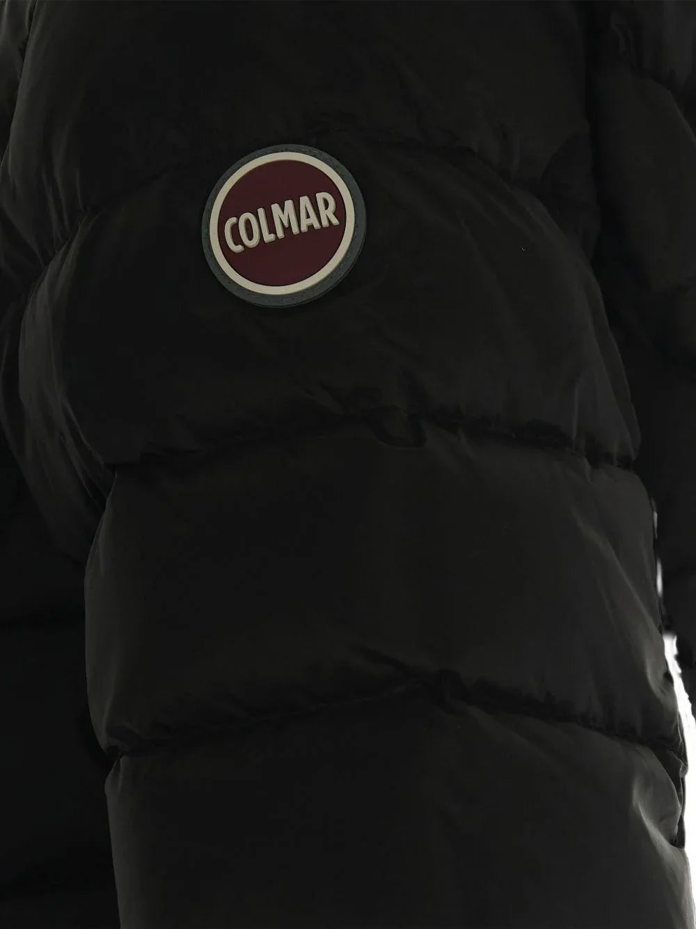 Piumino nero trapuntato con cappuccio in pelliccia - Preludio Moda