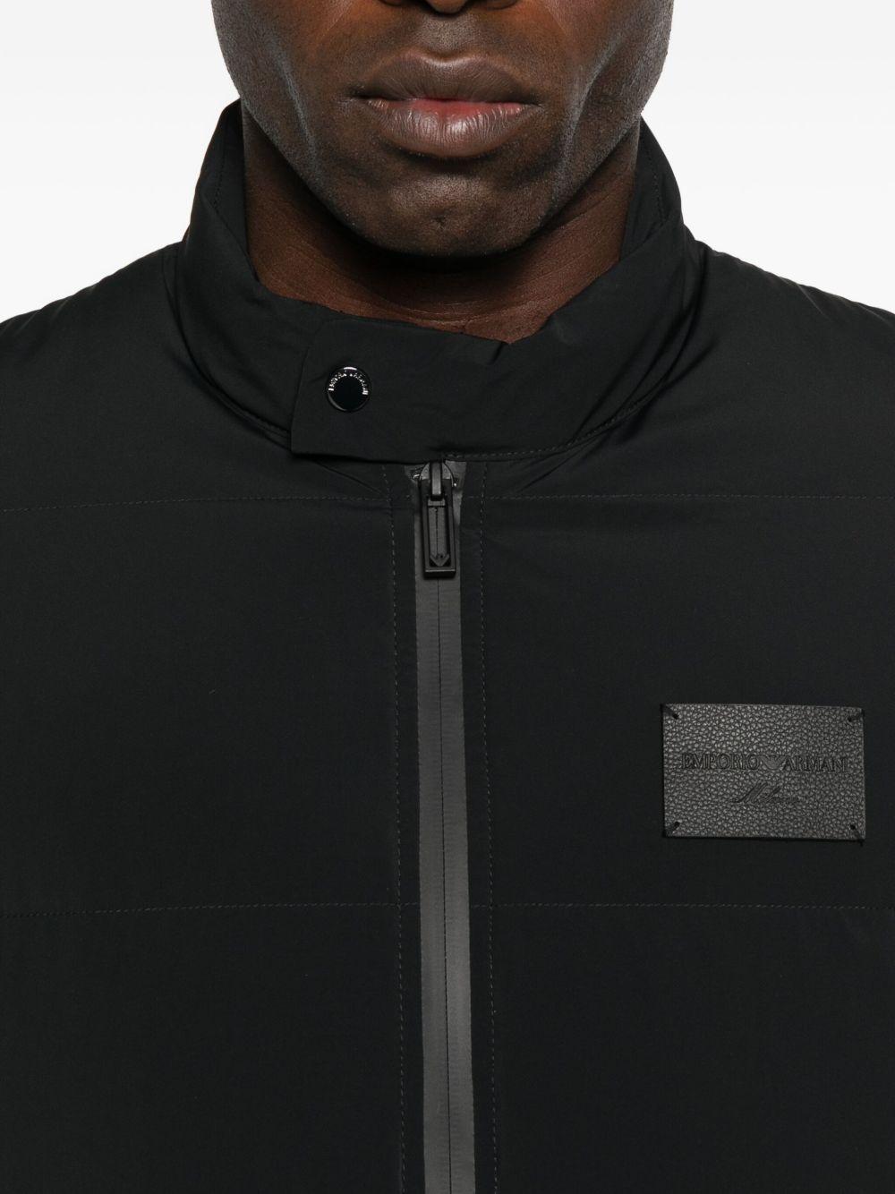 Giubbino nero con logo e chiusura a zip EM003278AF18499 UC001 EMPORIO ARMANI