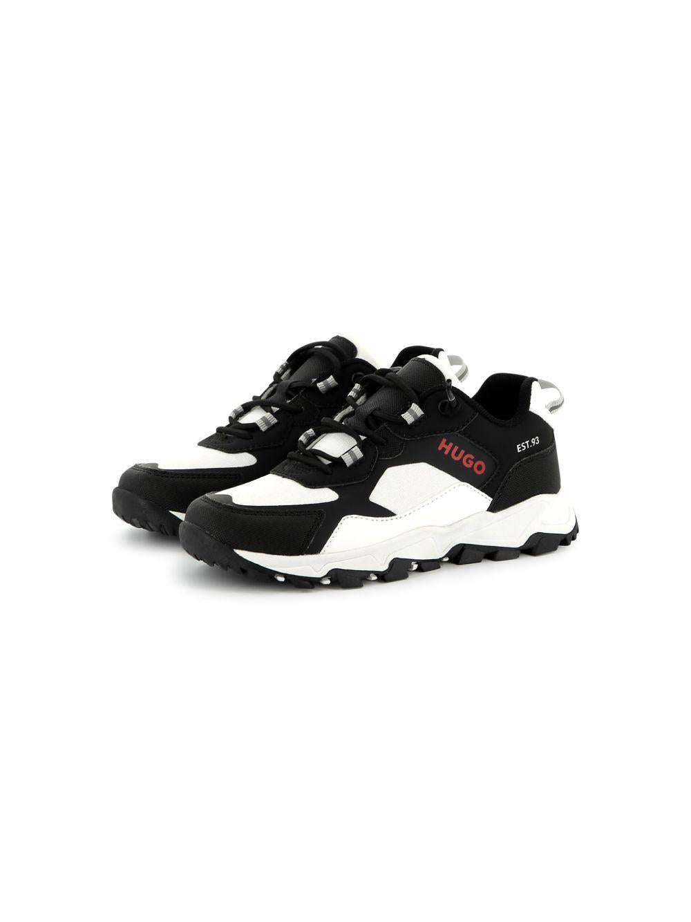 Sneakers bicolor bianca e nera logo laterale