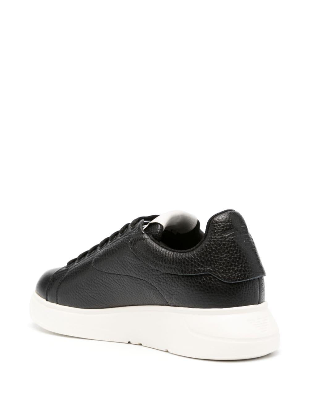 Sneakers in pelle bottolata nera