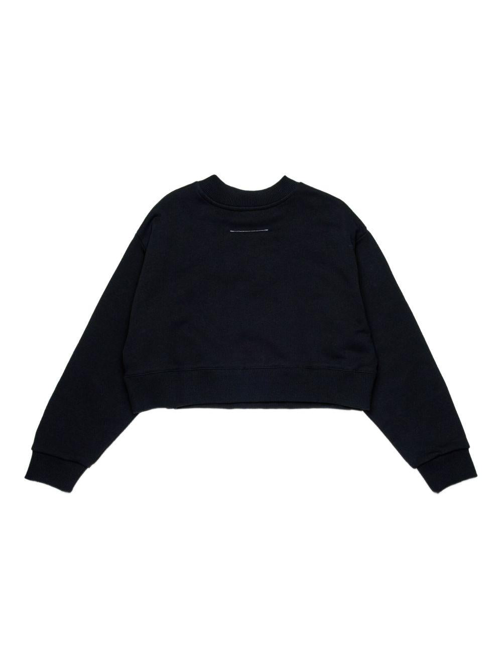 Felpa nera girocollo con applicazione frontale e logo numerico M60904MM04H M6900 MM6 MAISON MARGIELA KIDS