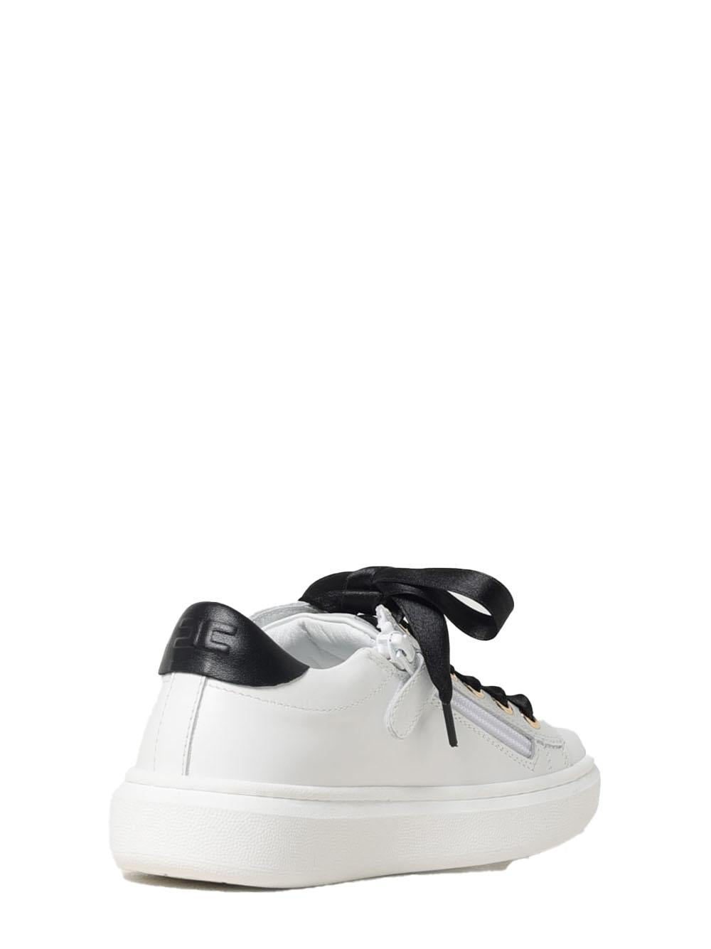 Sneakers bianche con lacci in raso neri