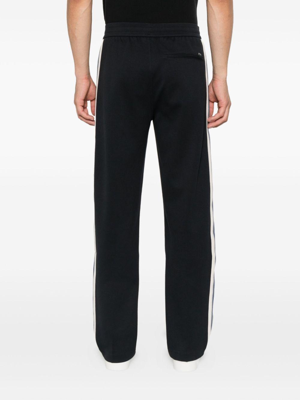 Pantaloni blu navy da tuta a righe laterali EM002873AF13488 UB118 EMPORIO ARMANI