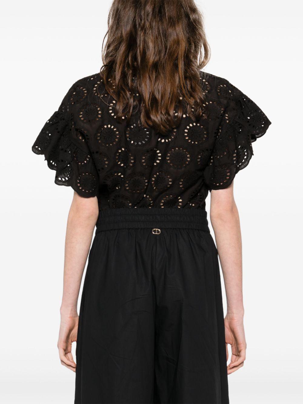 Blusa nera in pizzo sangallo