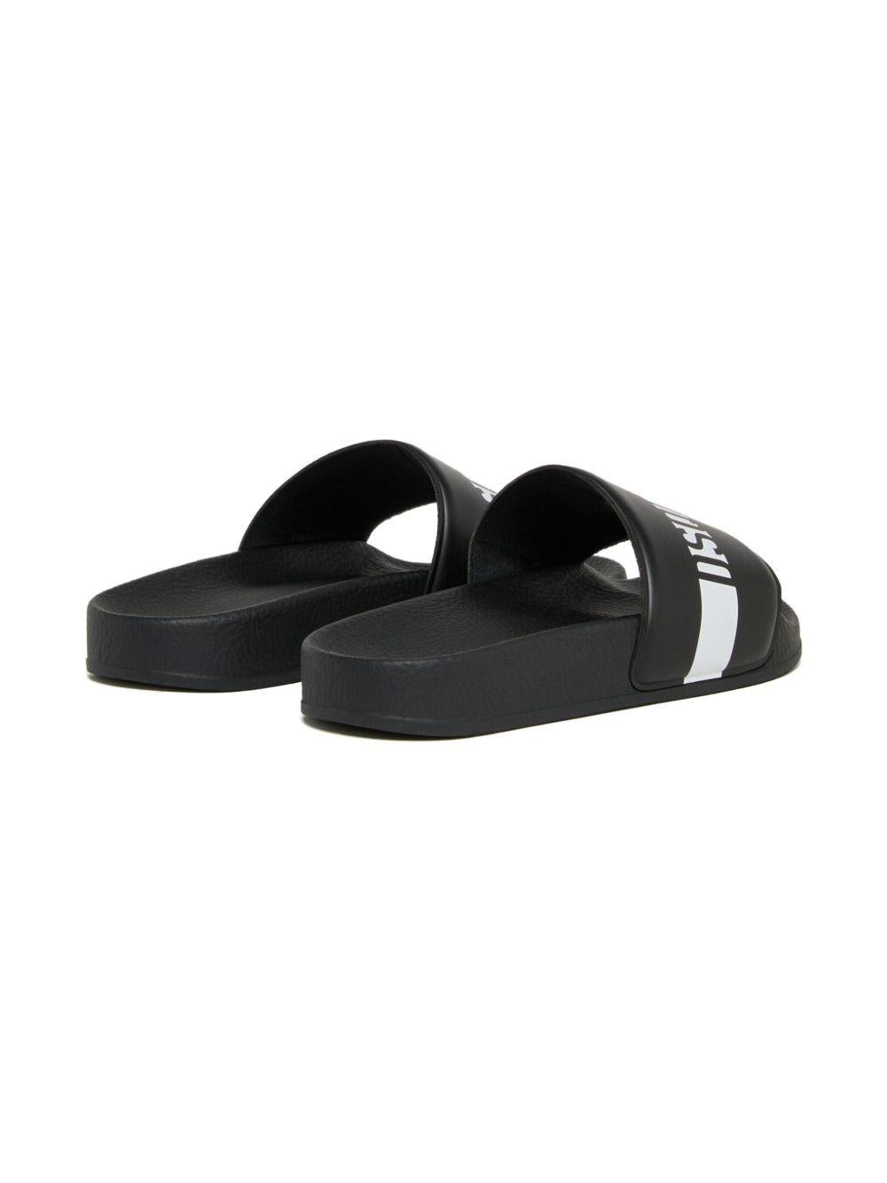 Ciabatte slip-on con logo a righe DQ3383KF025 DQ900 DSQUARED KIDS