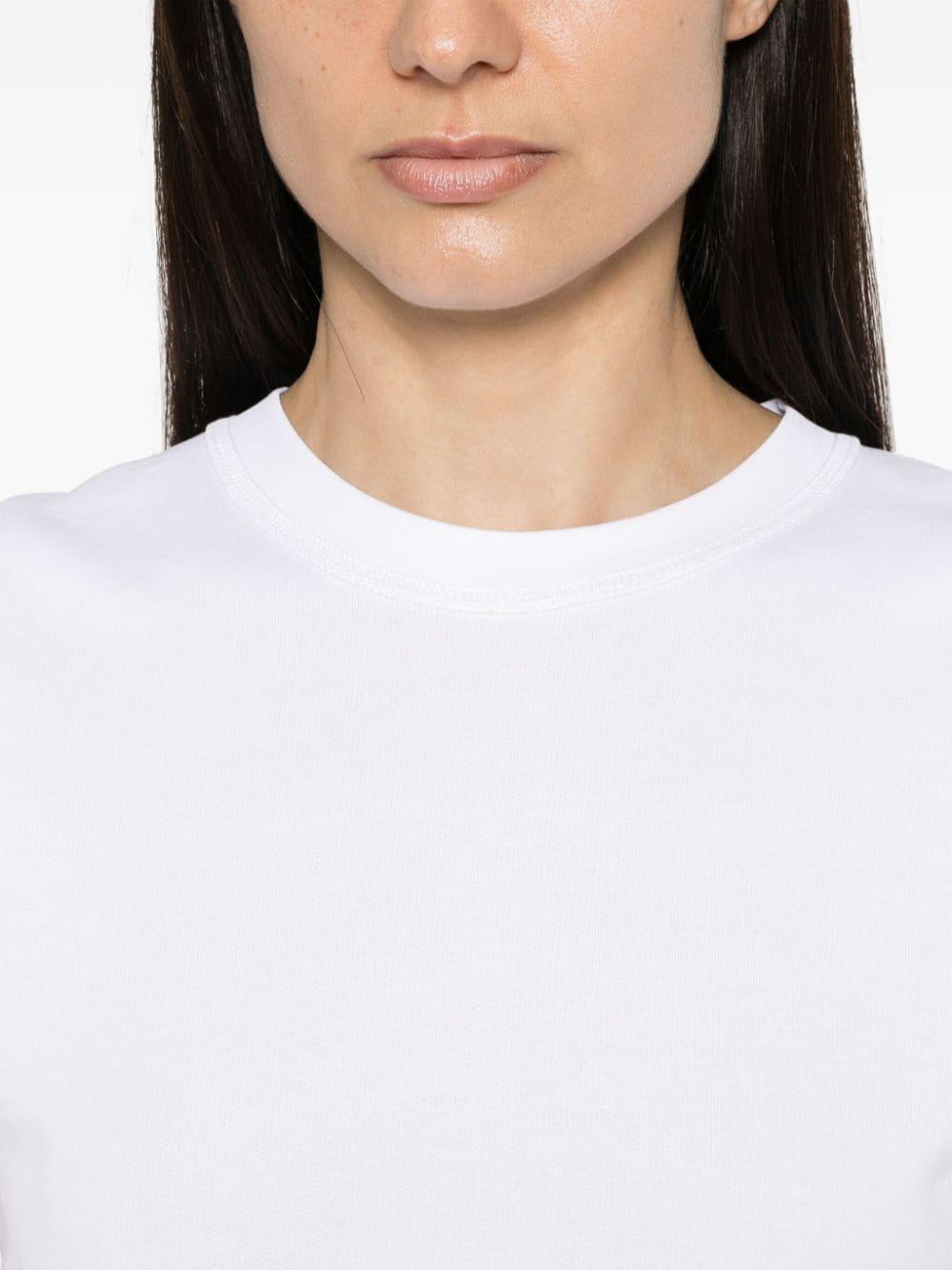 T-shirt bianca dettaglio catena